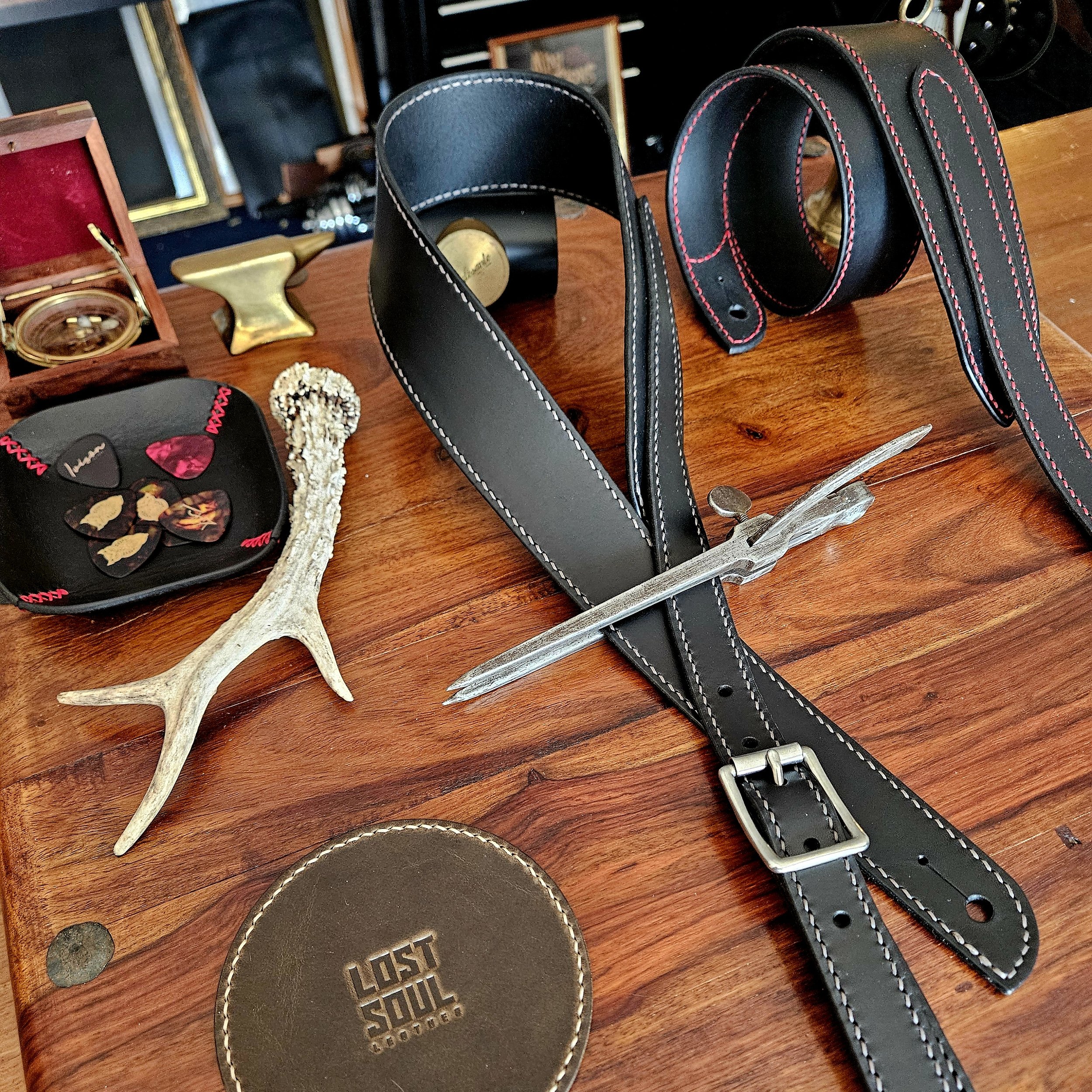 Hand made, hand stitched leather guitar strap. Highest quality UK sourced leather. Made to measure.
