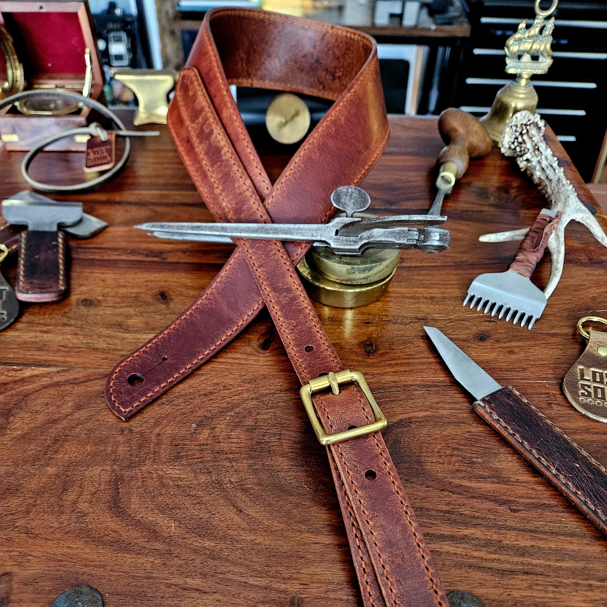 Hand made, hand stitched leather guitar strap. Highest quality UK sourced leather. Made to measure.