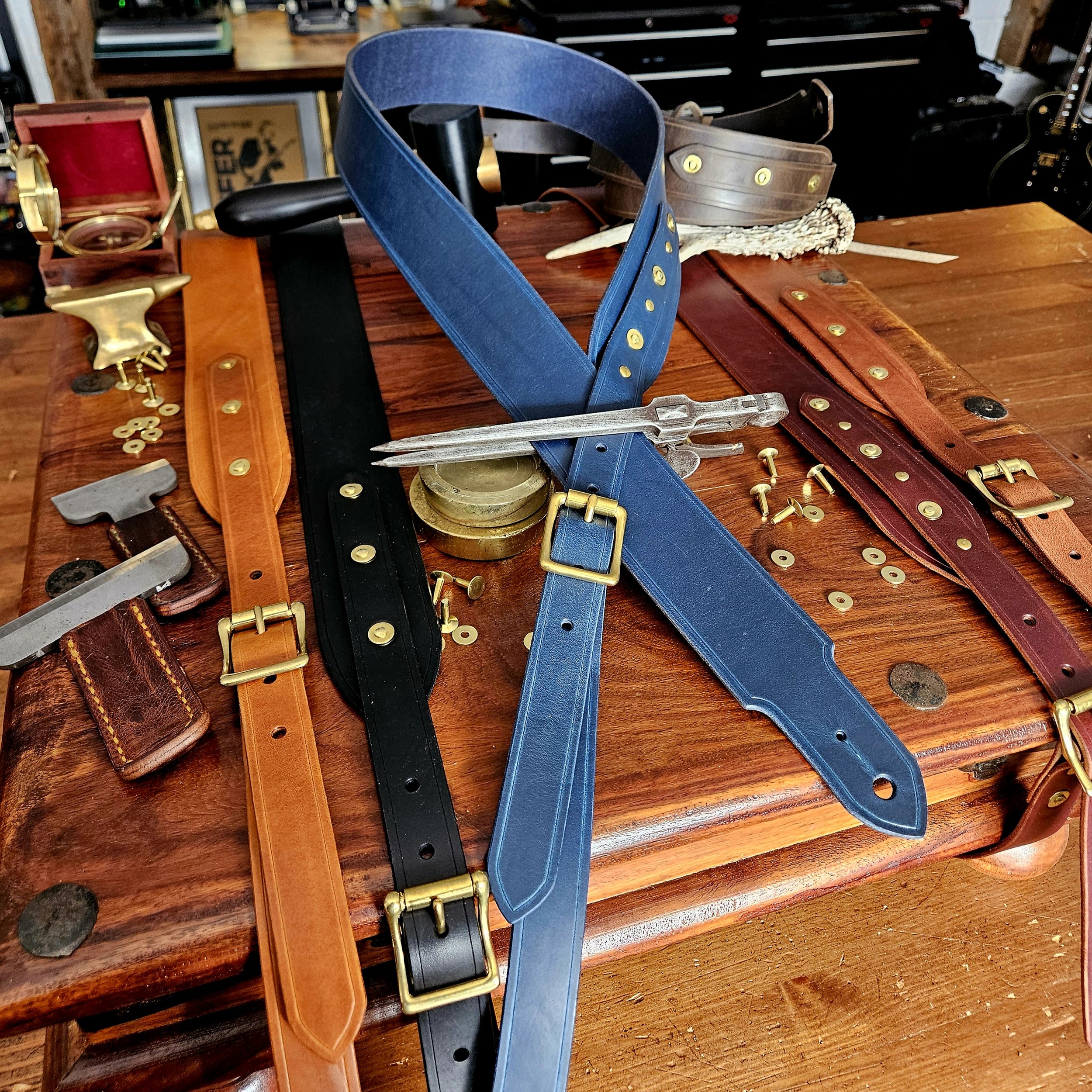 Hand made leather guitar strap. Solid Brass Buckle. Riveted. Made in UK.