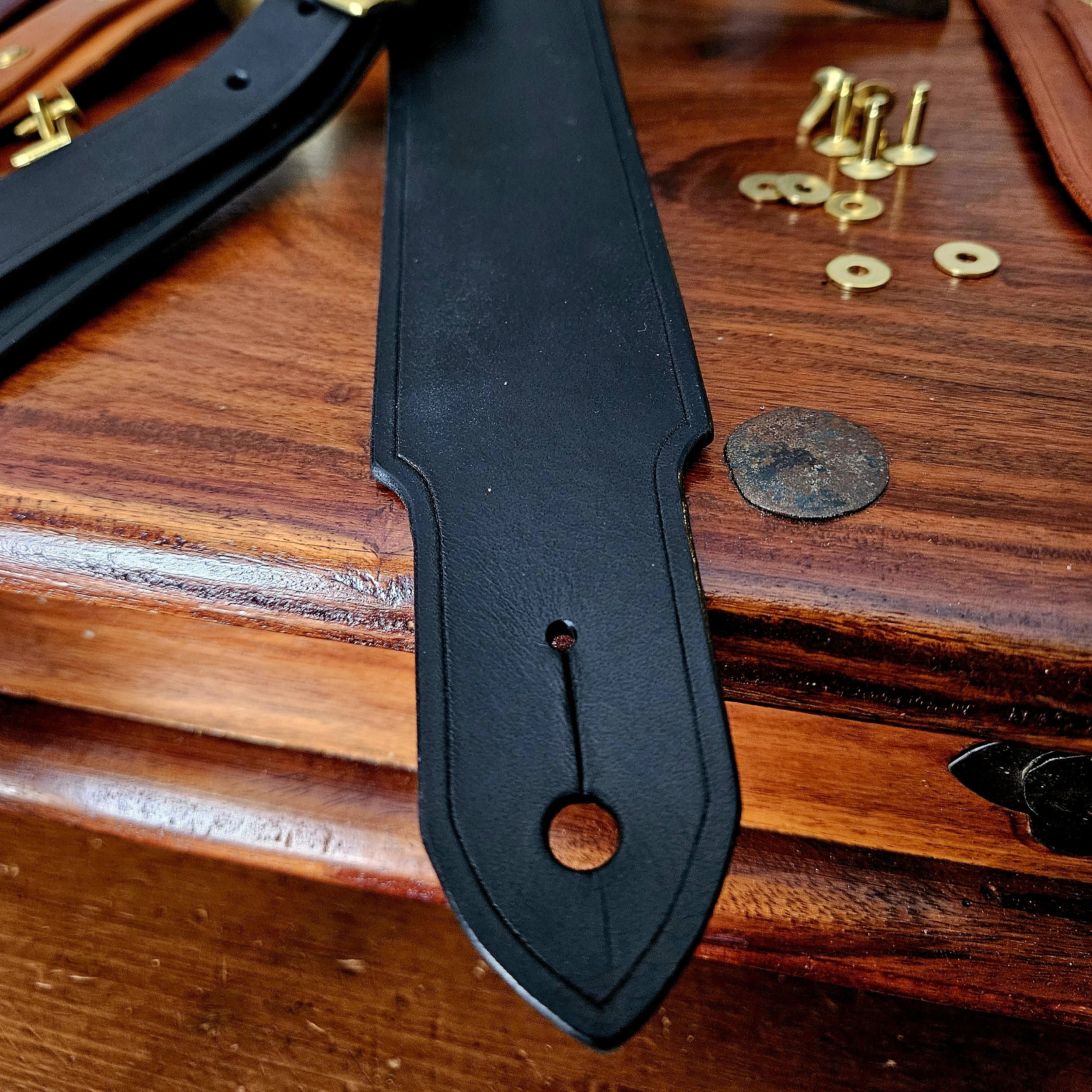 Hand made leather guitar strap. Solid Brass Buckle. Riveted. Made in UK.