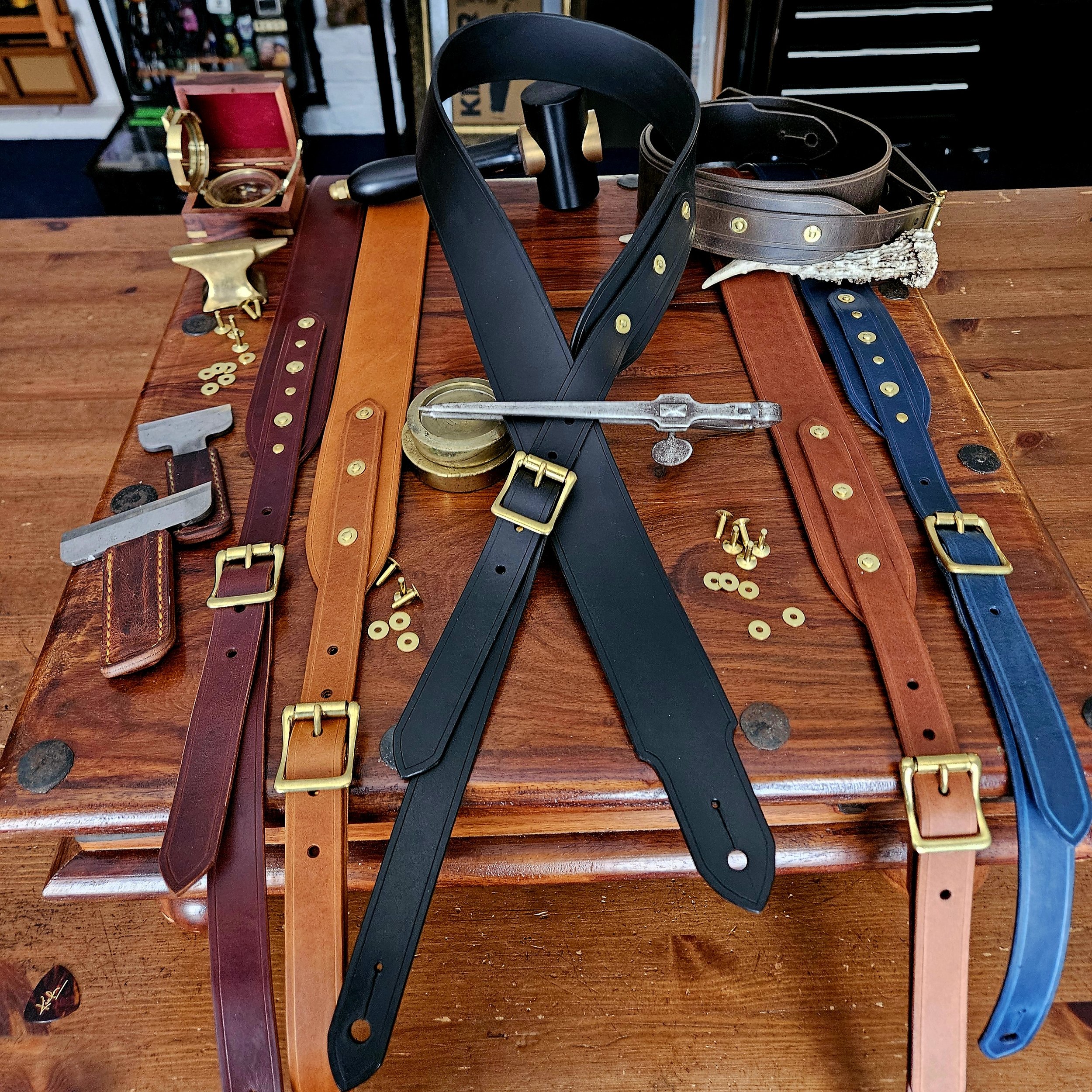 Hand made leather guitar strap. Solid Brass Buckle. Riveted. Made in UK.