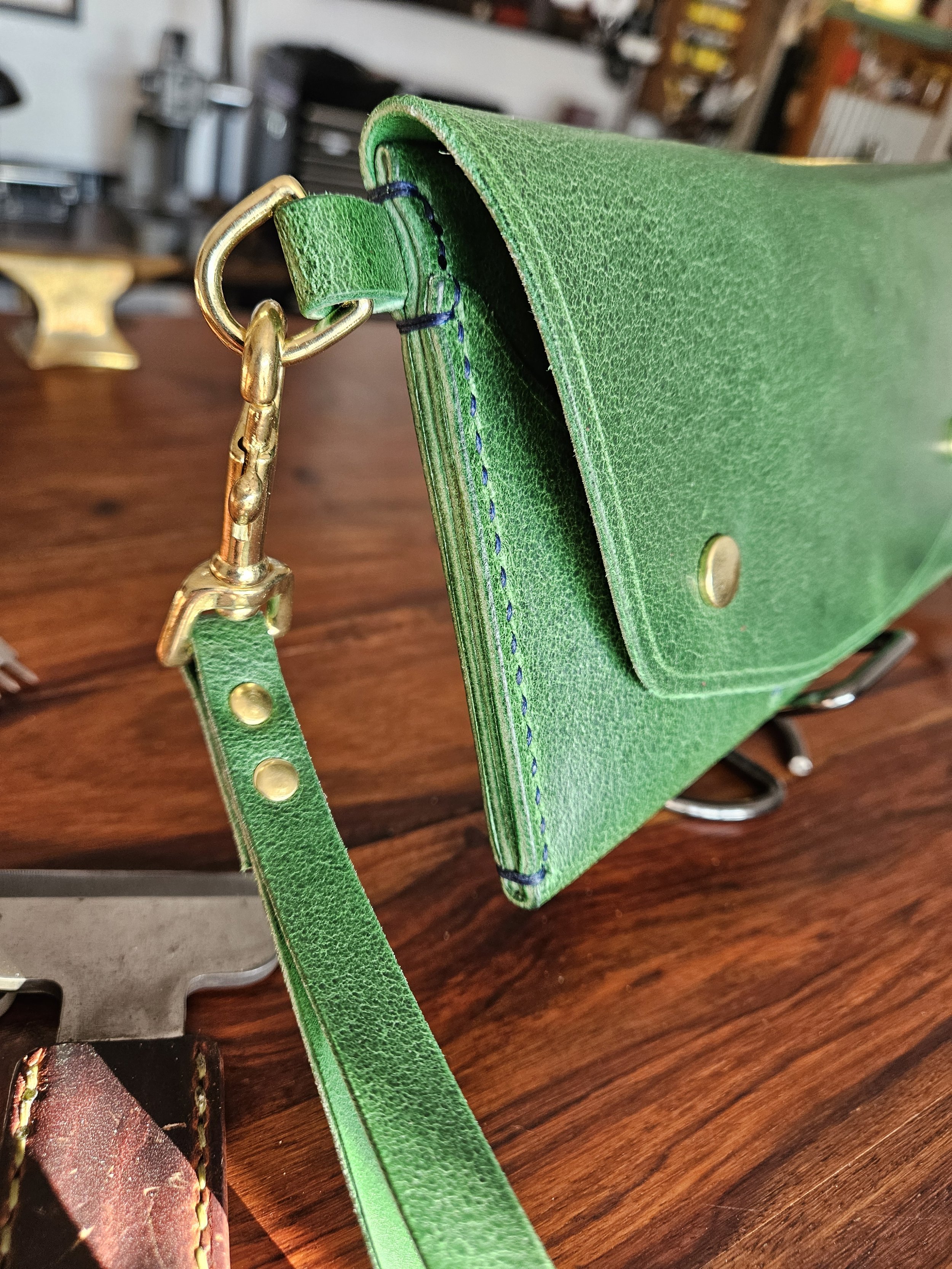 Ladies vegetable tanned leather handmade, hand stitched clutch purse.
