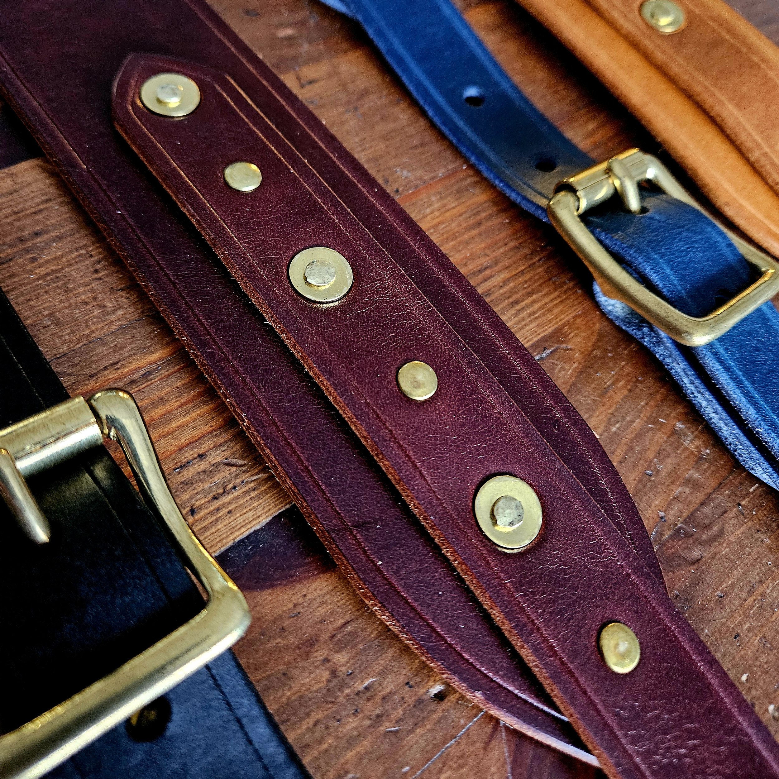 Hand made leather guitar strap. Solid Brass Buckle. Riveted. Made in UK.