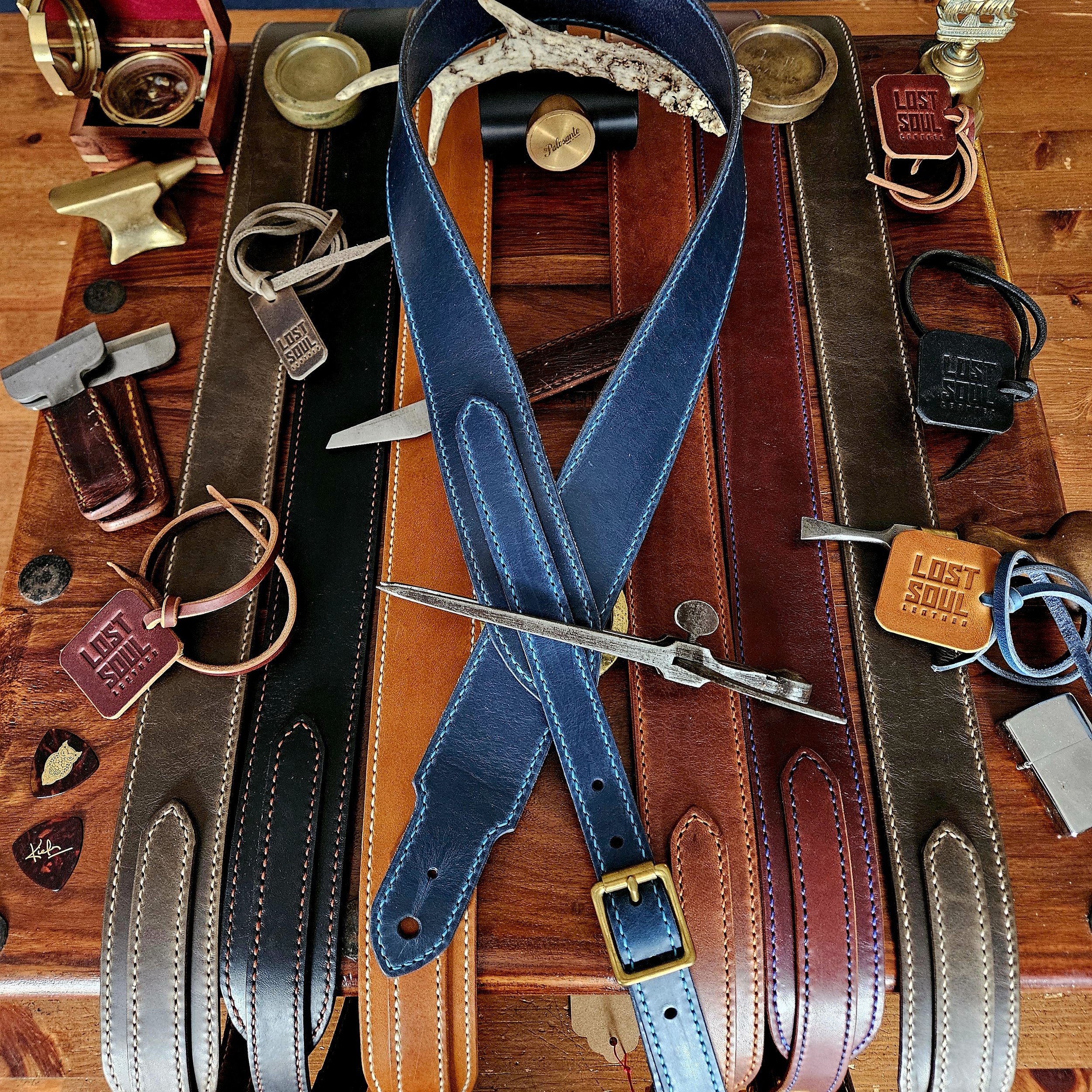 Hand made leather guitar strap. Hand stitched. Solid brass buckle. Made in UK.