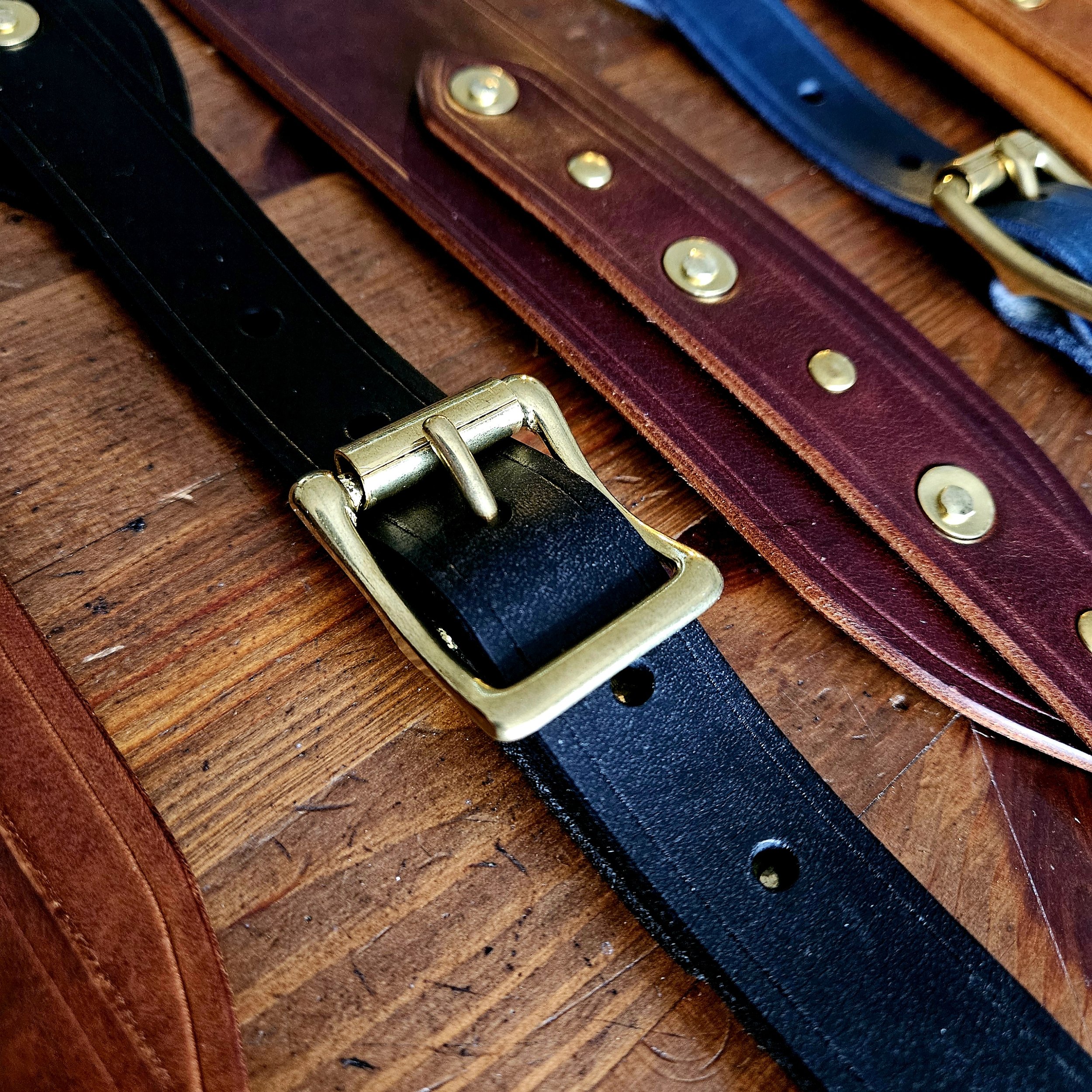 Hand made leather guitar strap. Solid Brass Buckle. Riveted. Made in UK.