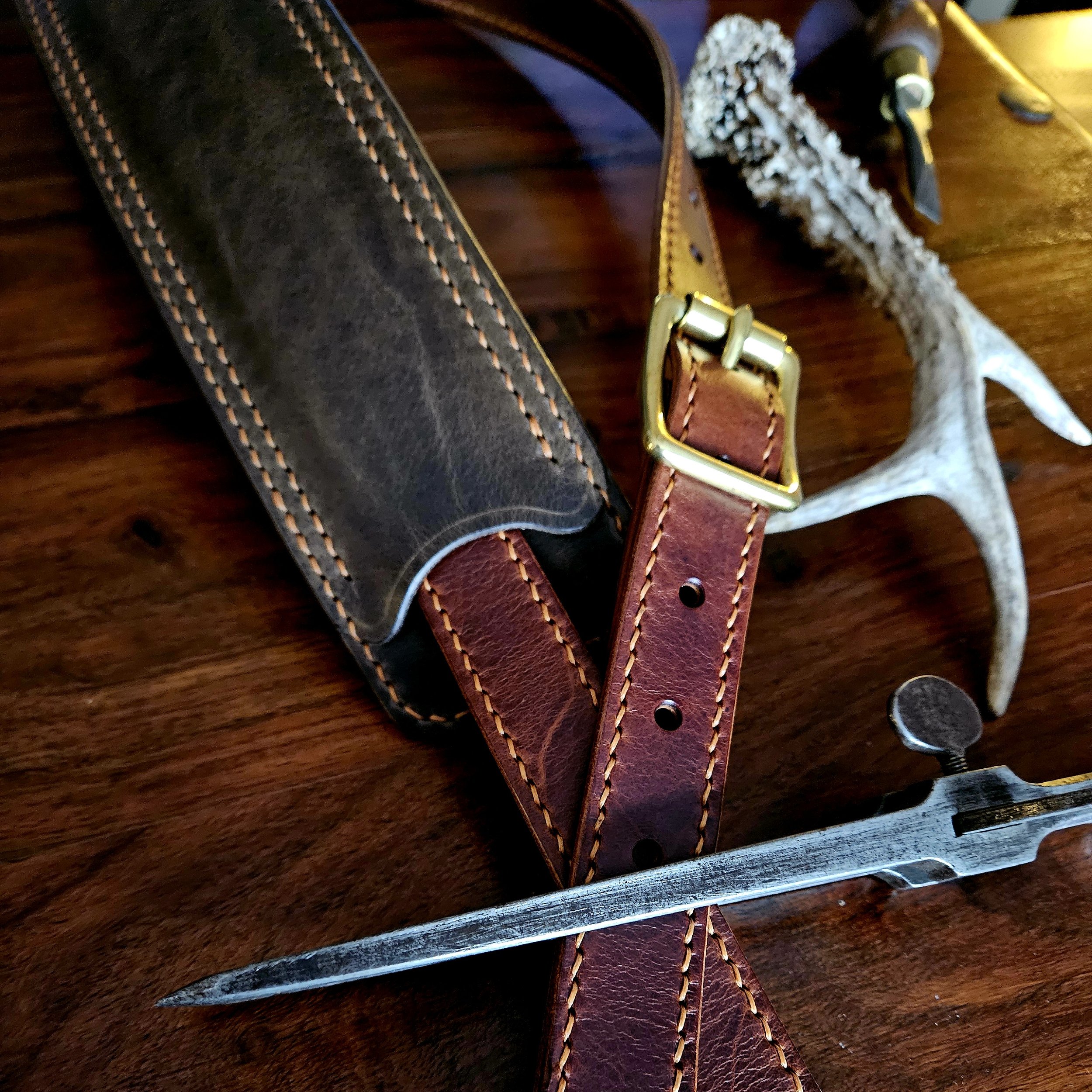 Hand made, hand stitched leather guitar strap. Highest quality UK sourced leather. Made to measure. Unique shoulder pad design.