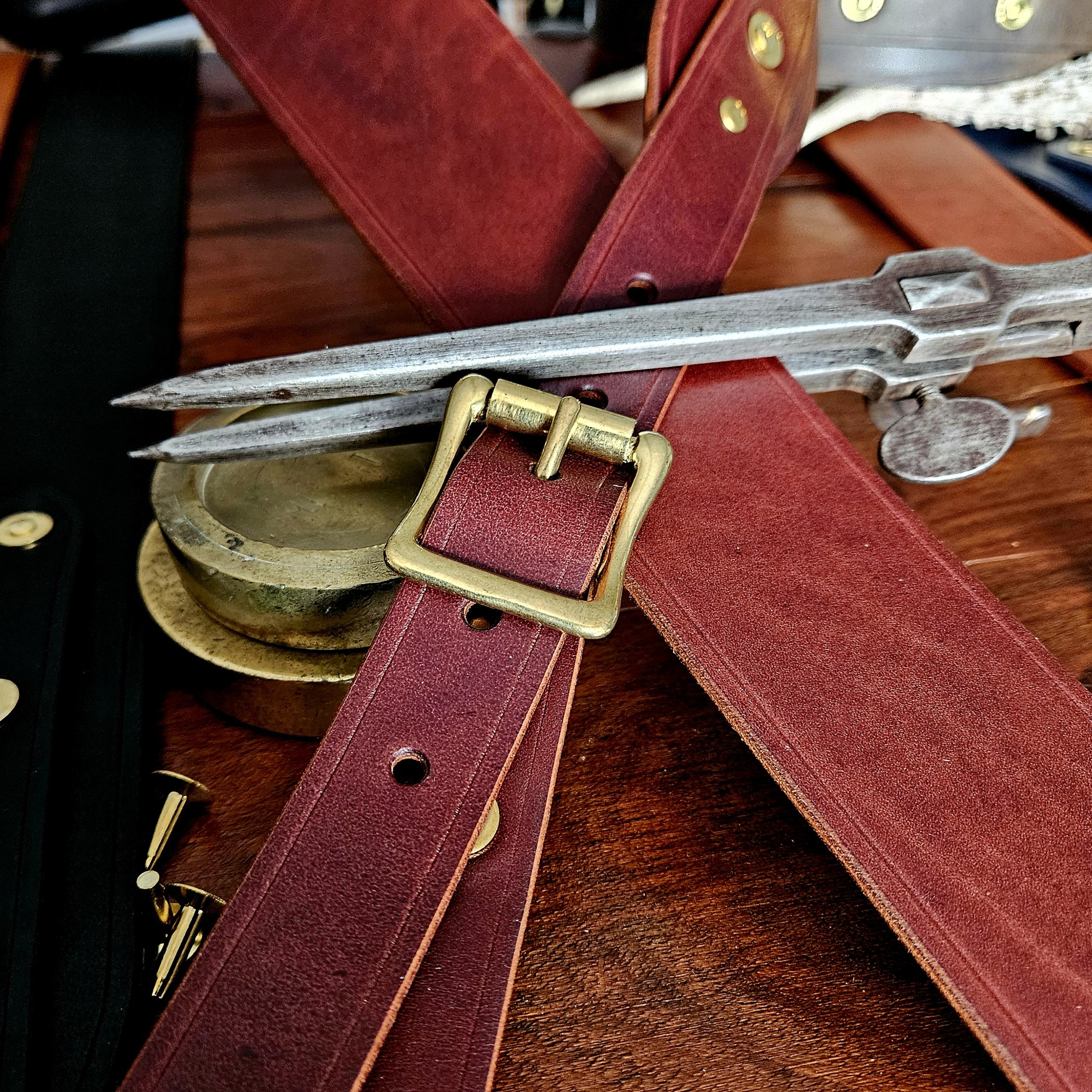 Hand made leather guitar strap. Solid Brass Buckle. Riveted. Made in UK.