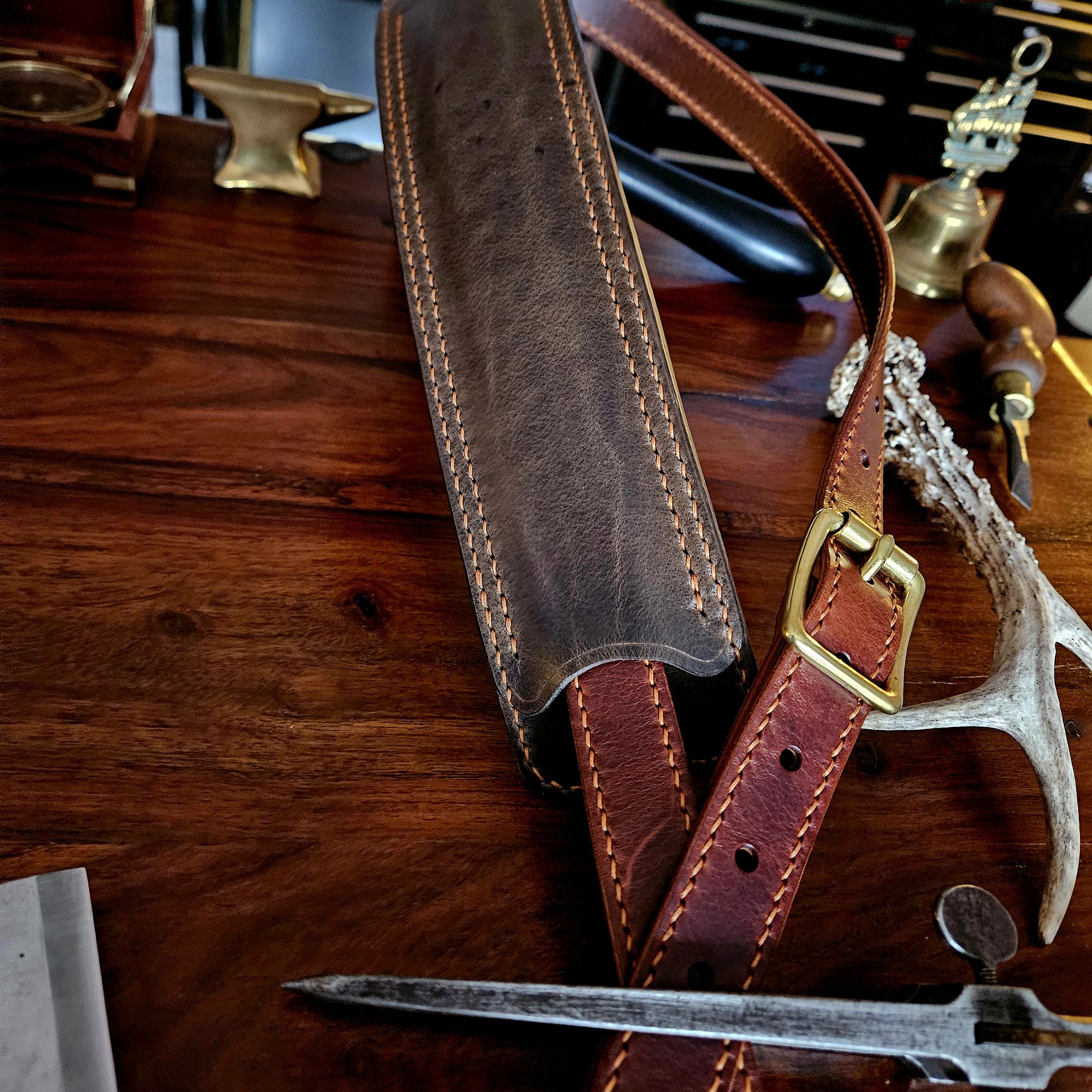 Hand made, hand stitched leather guitar strap. Highest quality UK sourced leather. Made to measure. Unique shoulder pad design.