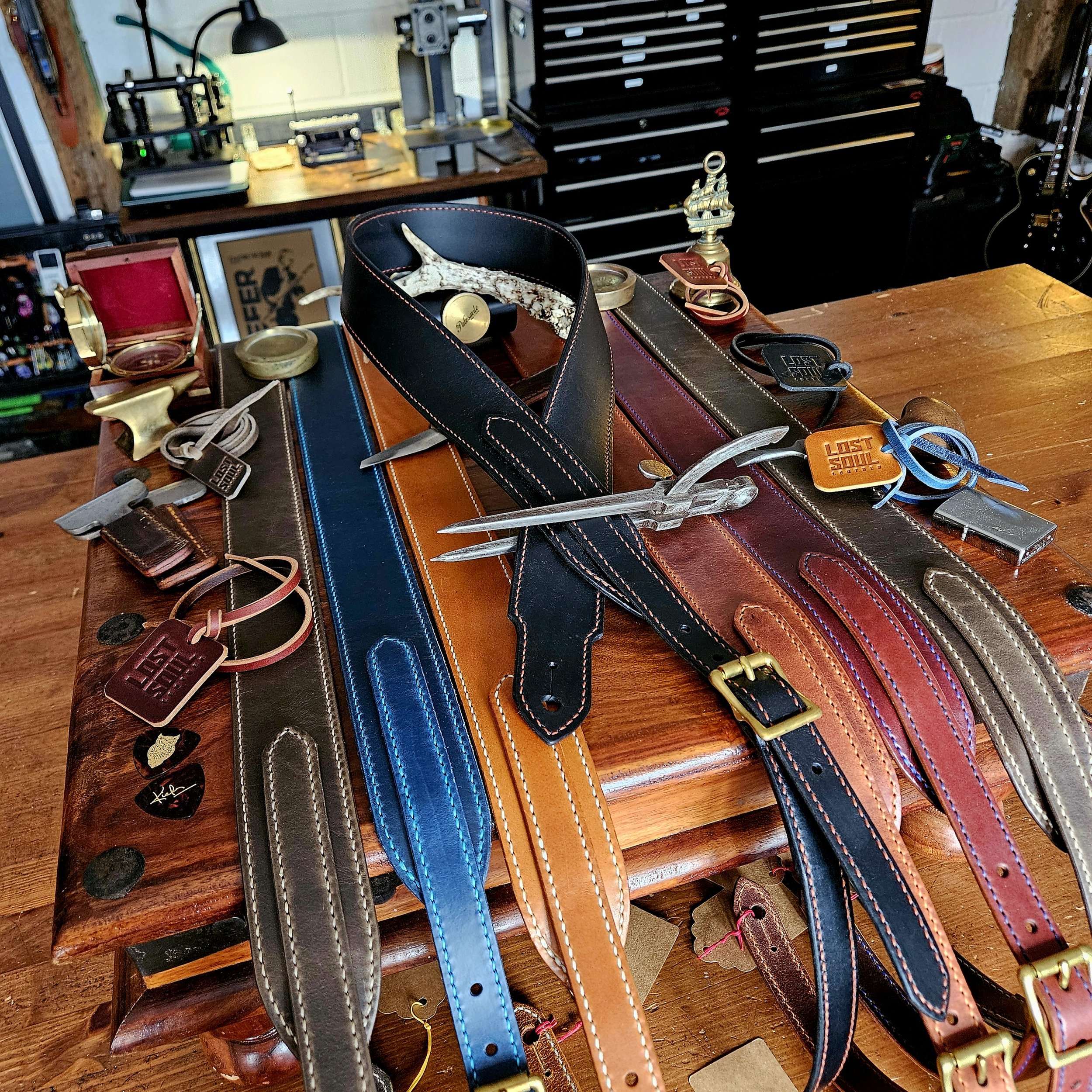 Hand made leather guitar strap. Hand stitched. Solid brass buckle. Made in UK.