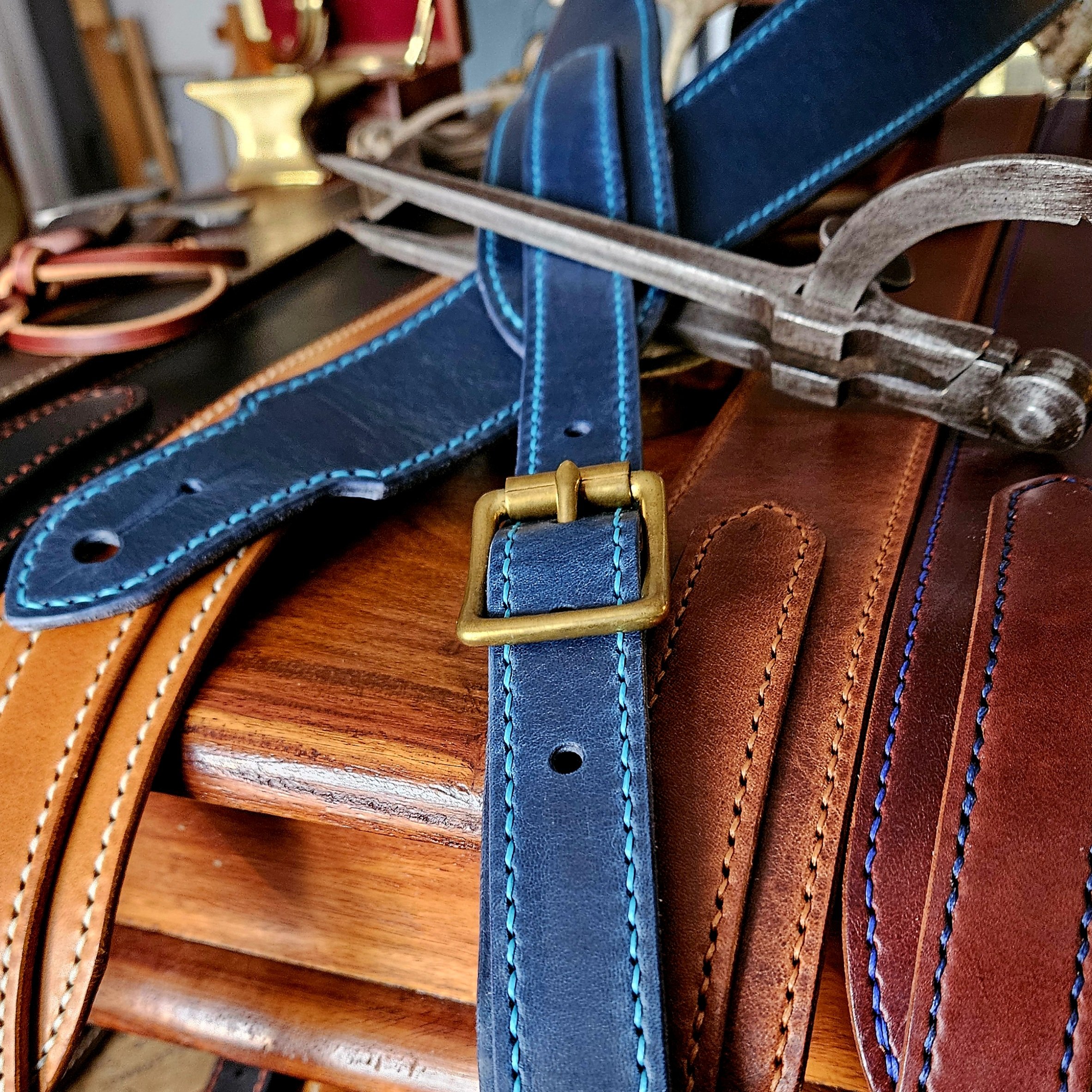 Hand made leather guitar strap. Hand stitched. Solid brass buckle. Made in UK.