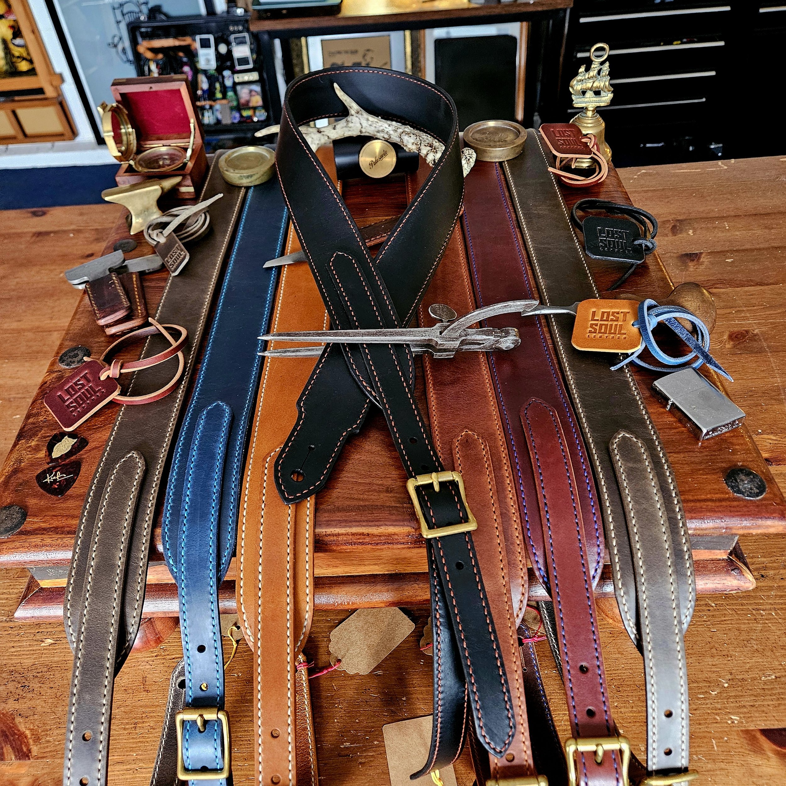 Hand made leather guitar strap. Hand stitched. Solid brass buckle. Made in UK.