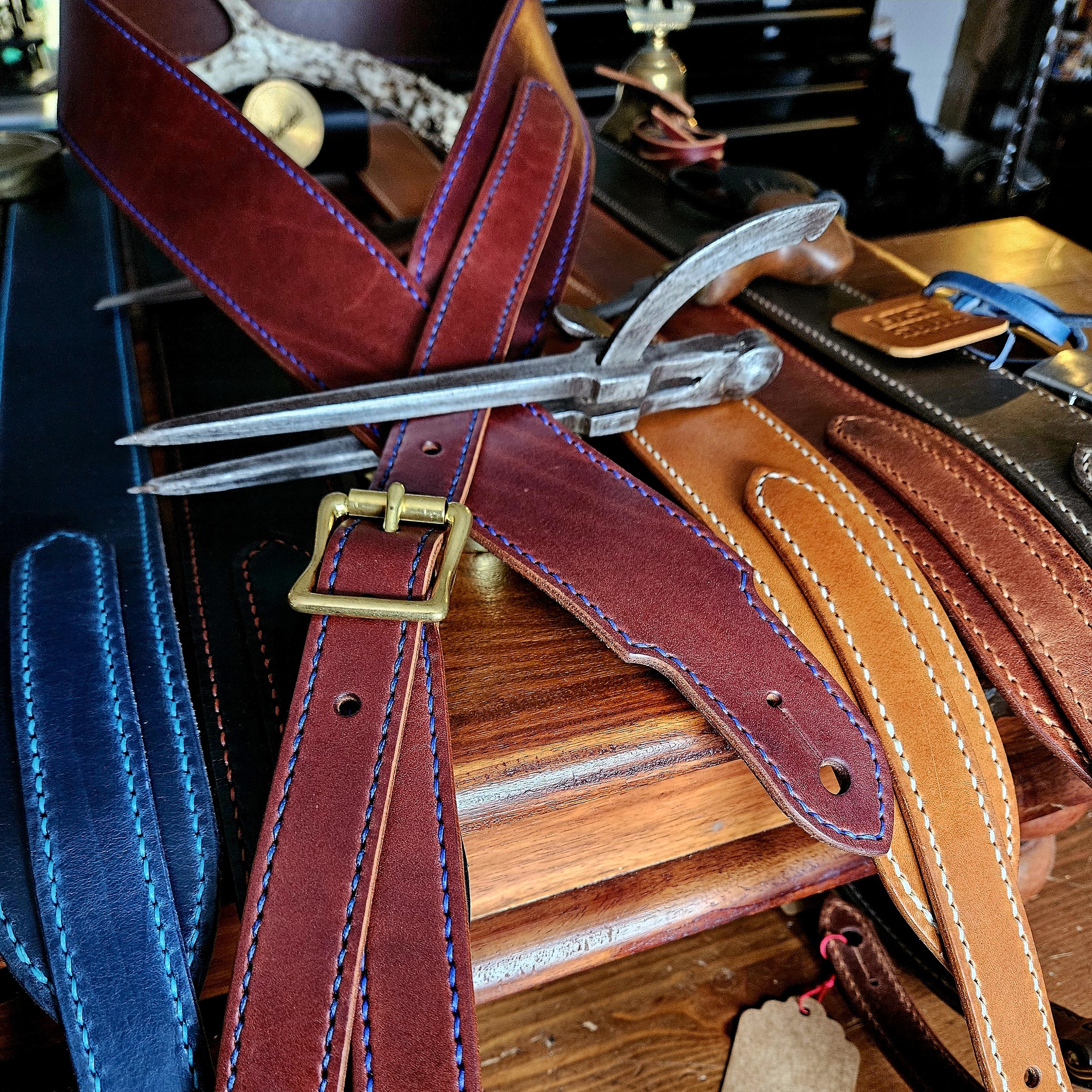 Hand made leather guitar strap. Hand stitched. Solid brass buckle. Made in UK.