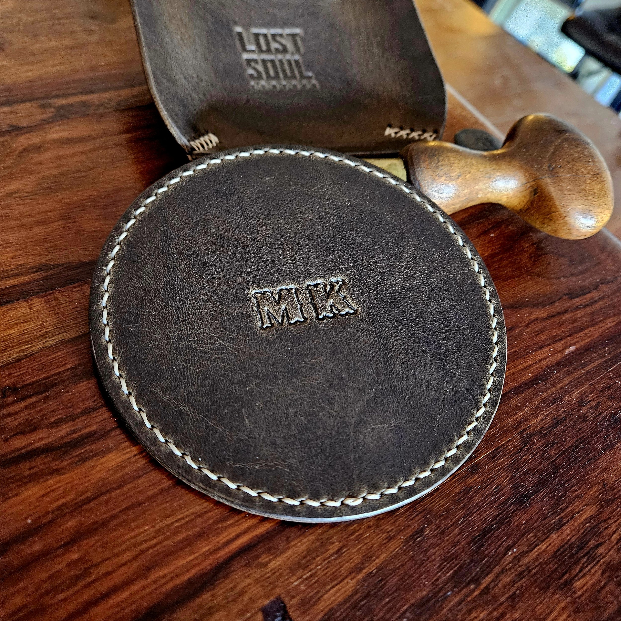 Hand stitched vegetable tanned leather coaster. Personalised.