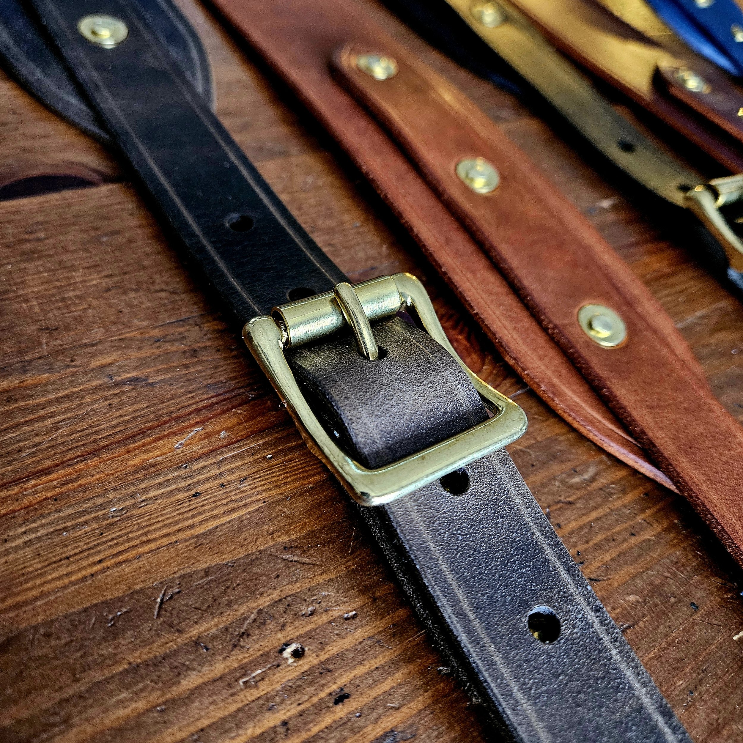 Hand made leather guitar strap. Solid Brass Buckle. Riveted. Made in UK.