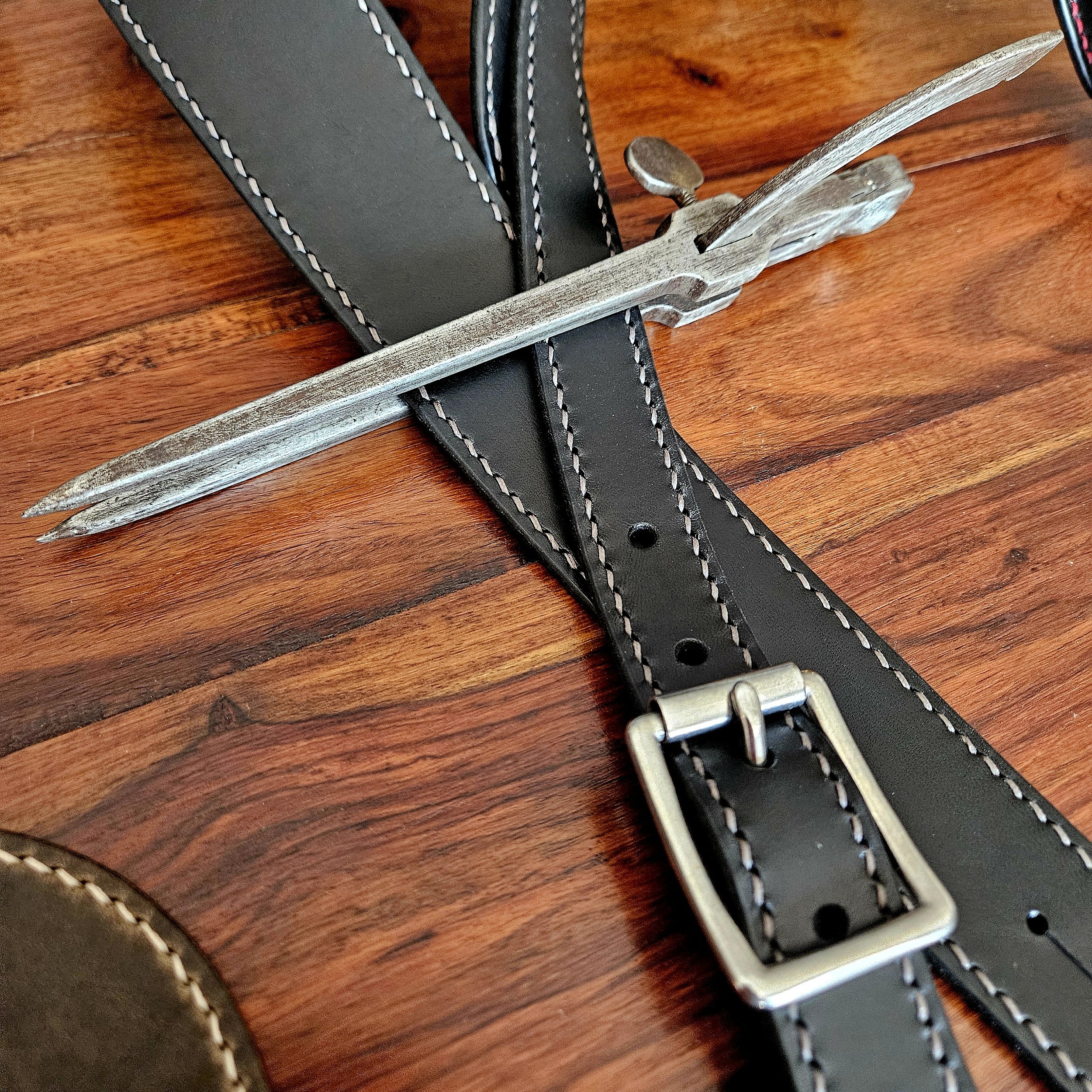 Hand made, hand stitched leather guitar strap. Highest quality UK sourced leather. Made to measure.