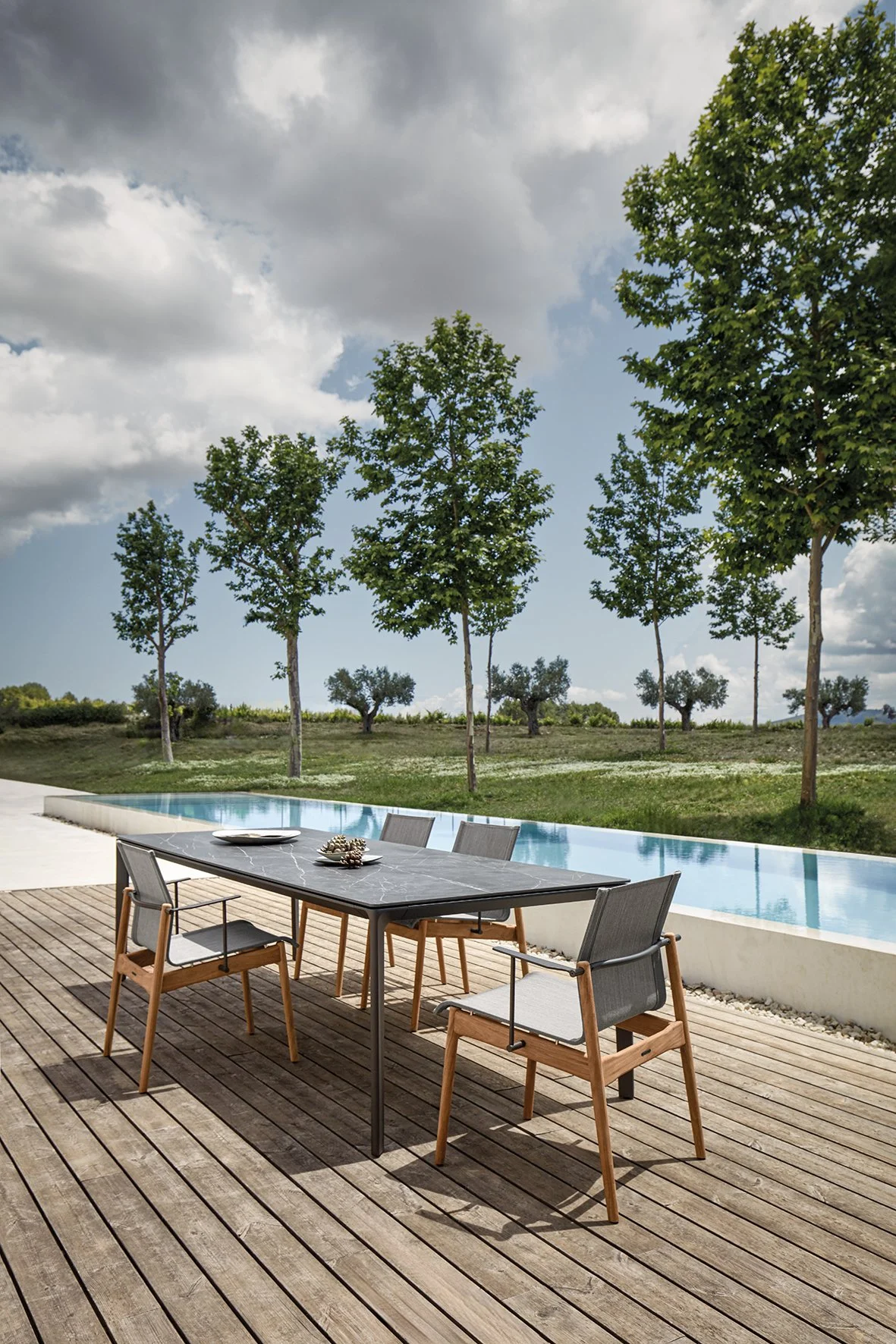 carver ceramic & sway teak dining set_3.jpg