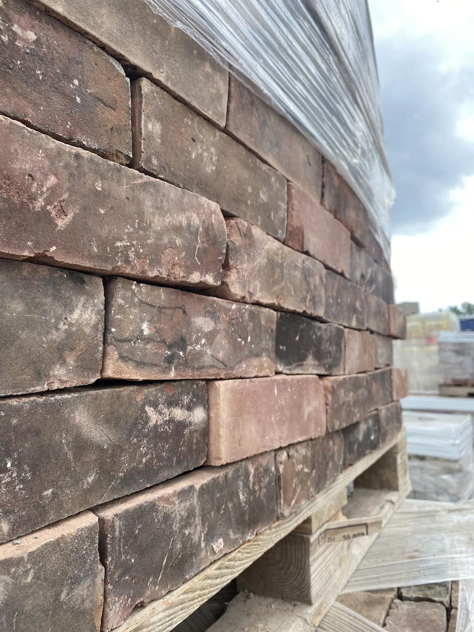 ArcanaMaterials_ReclaimedBrick_WolfreyRed_angle view.JPEG