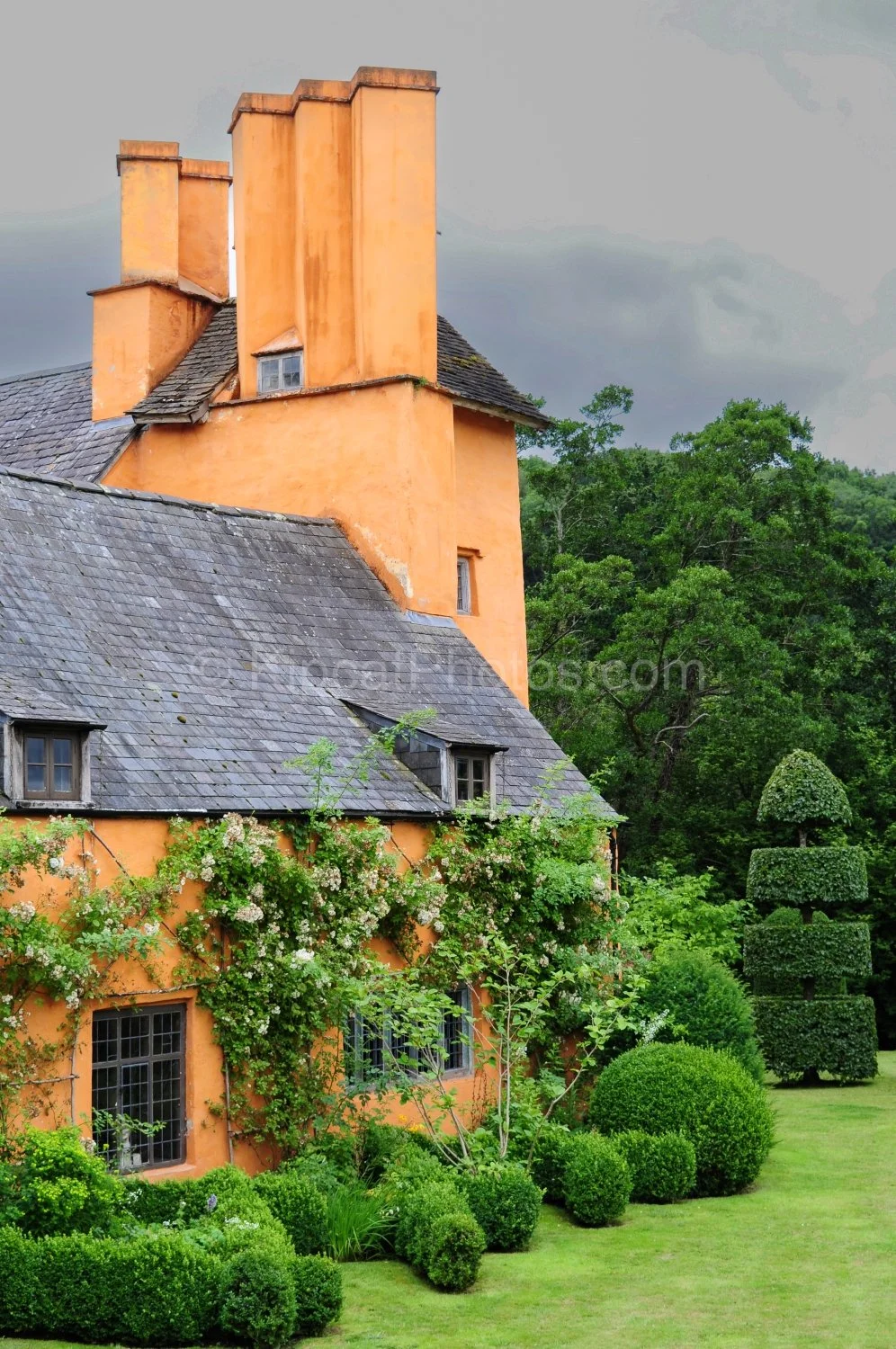 allt-y-bela-chimneys-topiary-stormy-sky-roses.jpg.jpg