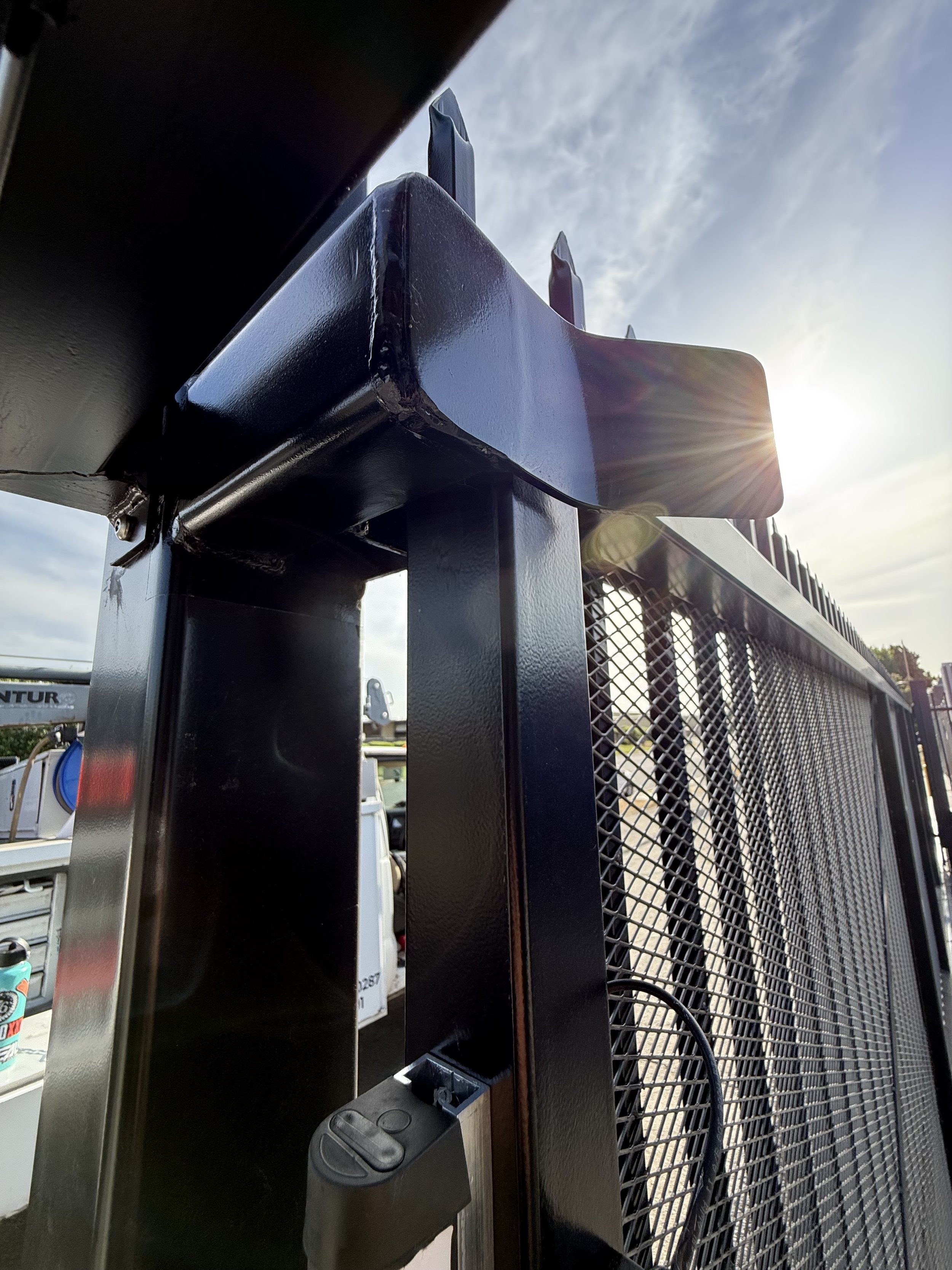 Industrial-grade slide gate with automation features installed at commercial lot in San Fransisco