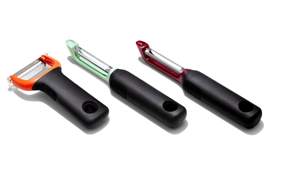 three kitchen peelers with ergonomic grips