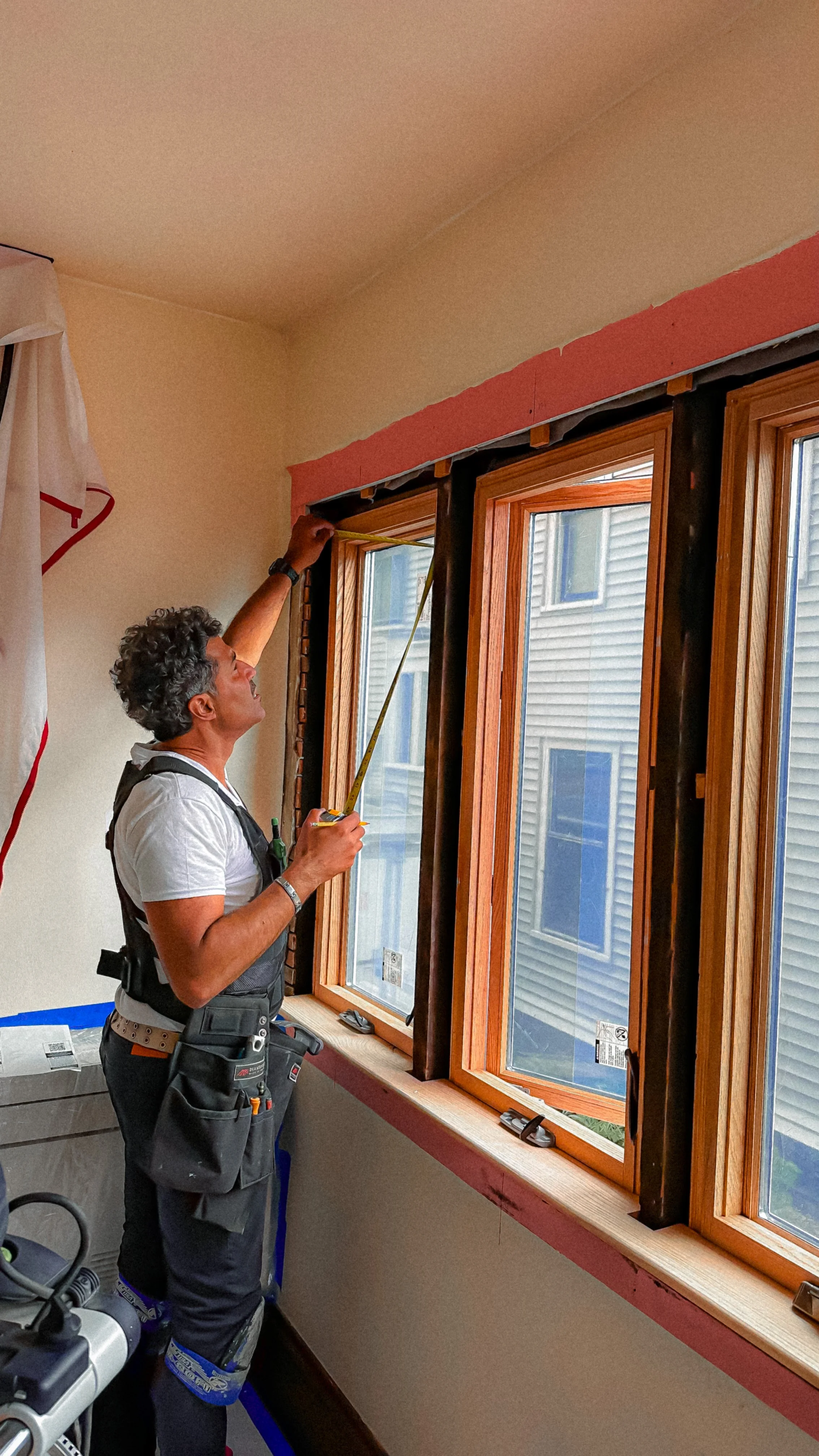 Matthew working on custom trim for windows.