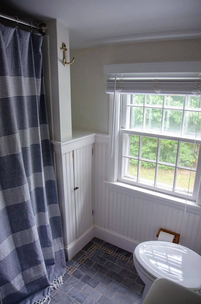 Nautical hooks in every room for hanging towels & swimsuits