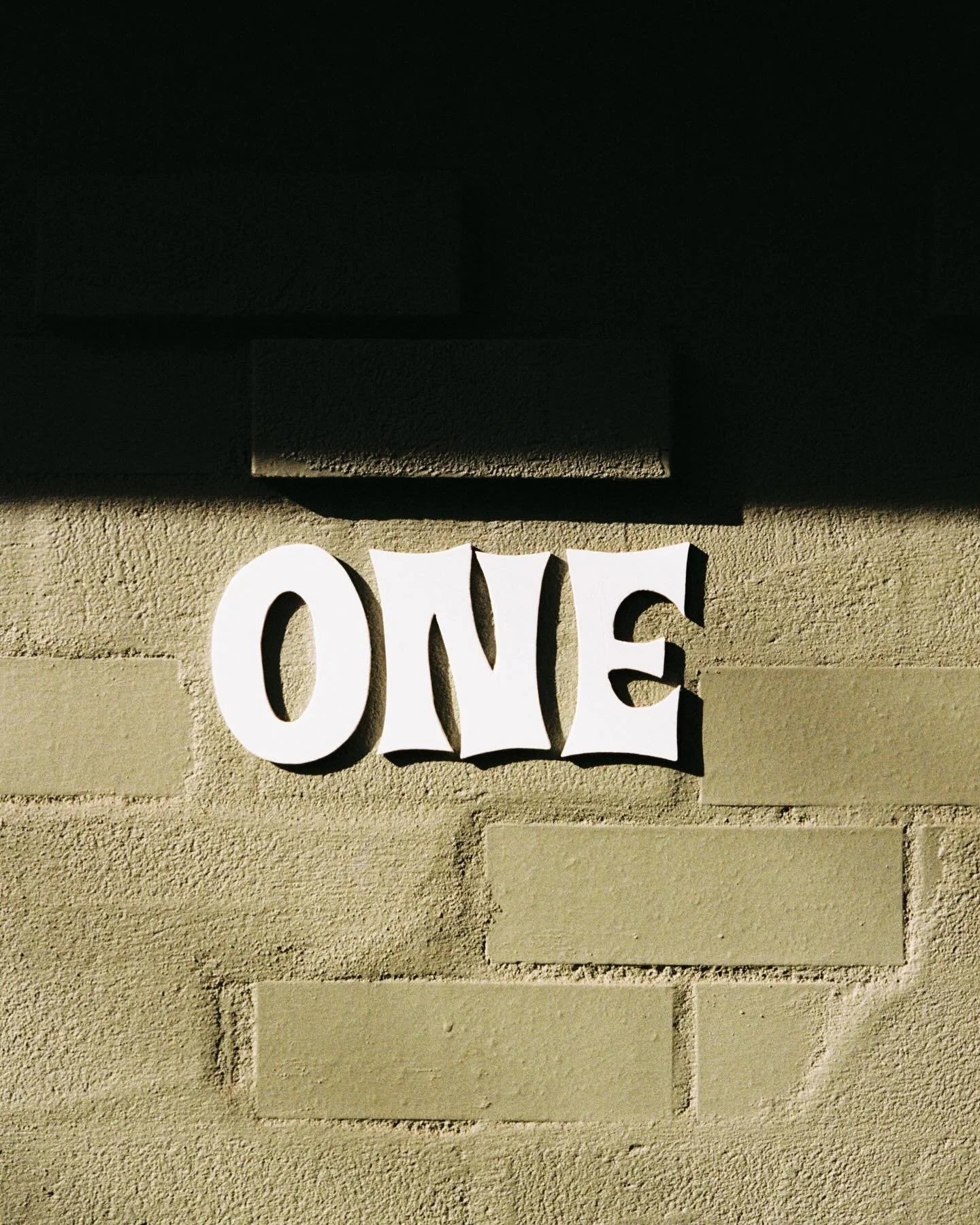 Tiki Magic meets a pale eucalypt bagged wall. I searched far and wide for unique house numbers &mdash; then decided to make my own.  @steadyhandsvideo