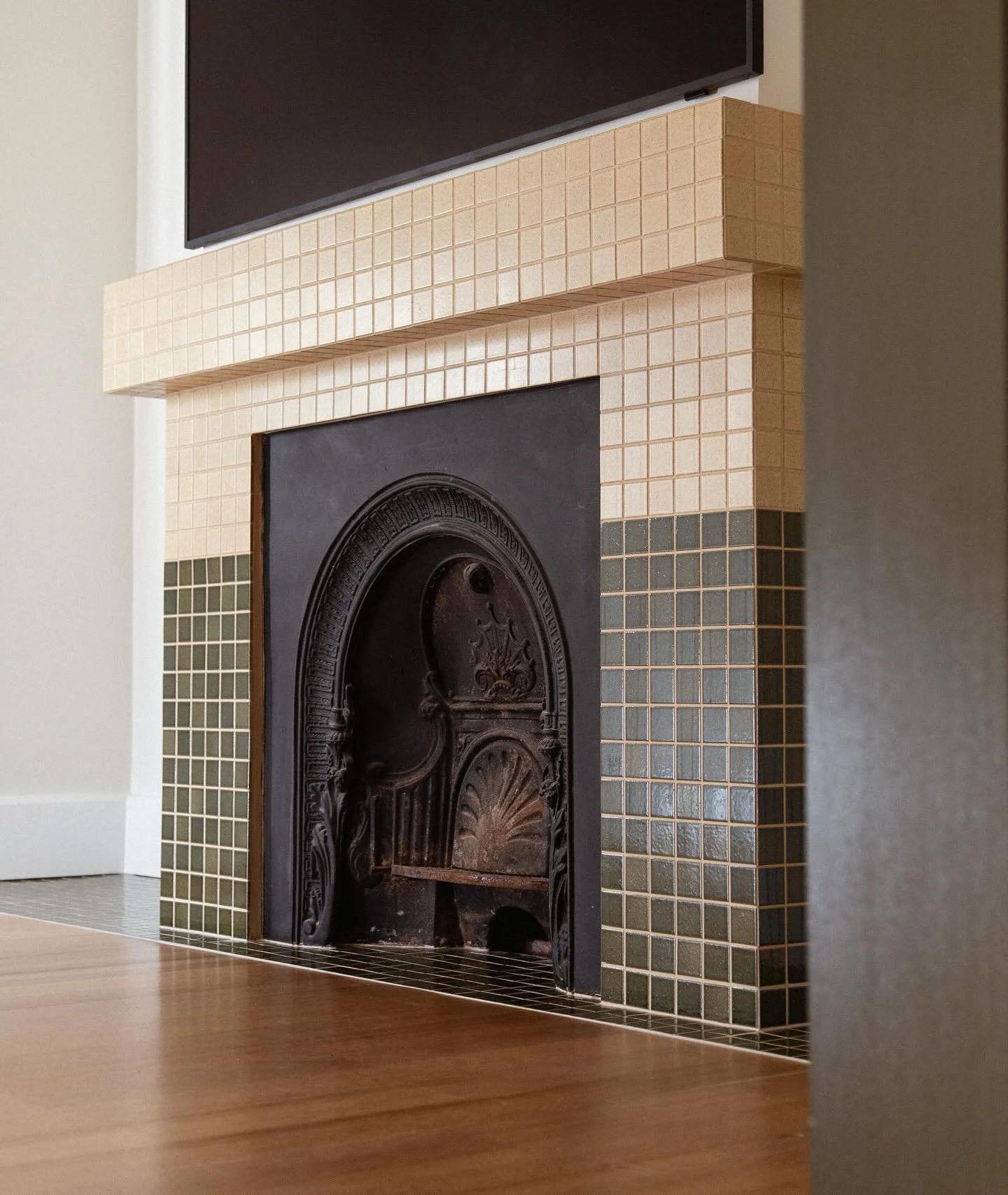 Heritage charm meets modern detail &mdash; a tiled fireplace reborn, thanks to masterful tiling. Designed by @cantileverinteriors captured by @steadyhandsvideo