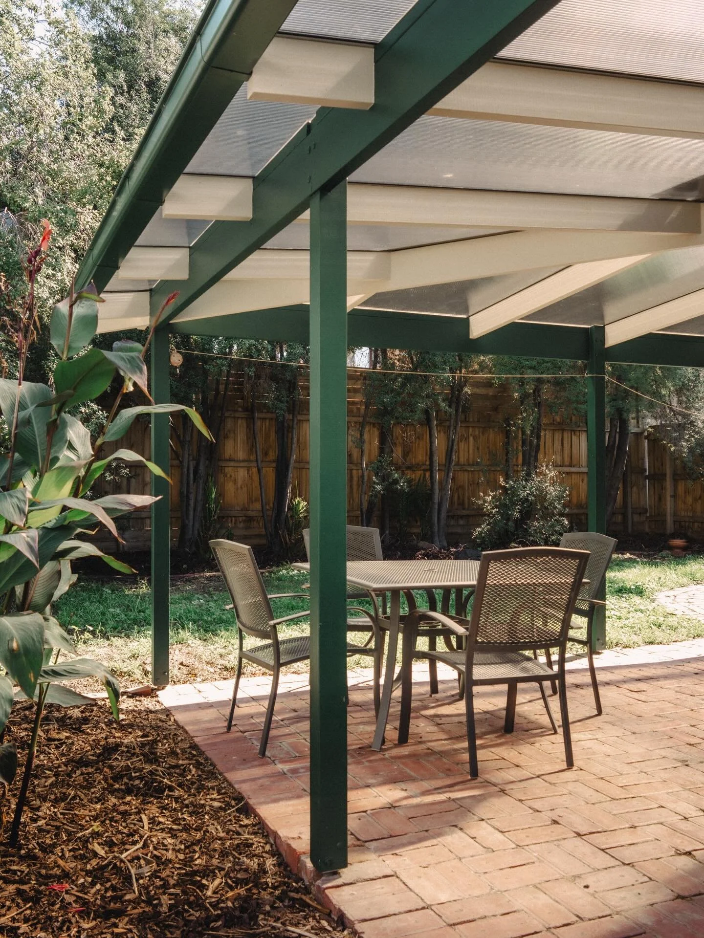 Ampelite multiwall in light bronze. Soft natural light, with no harsh glare and no battens required. A Brunswick alfresco completed last year.  Captured by @steadyhandsvideo  painting by @ssvpaintinganddecorating