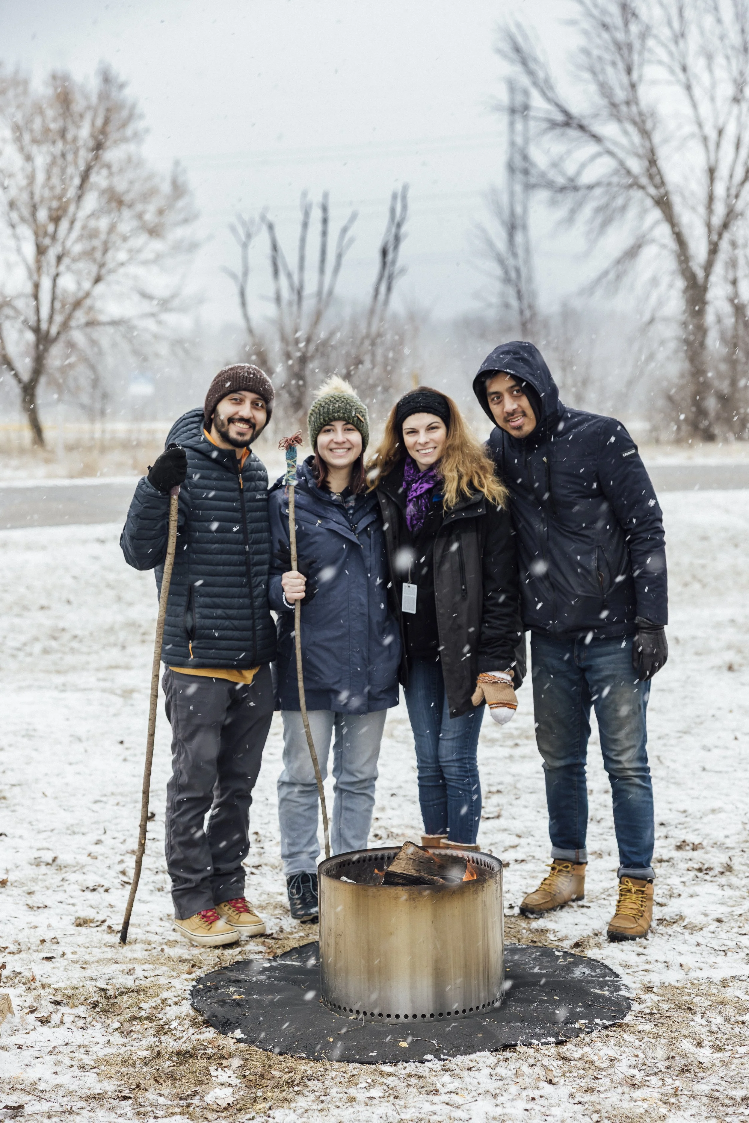 A solo stove bonfire pit burns in front of a beautiful outdoor backdrop