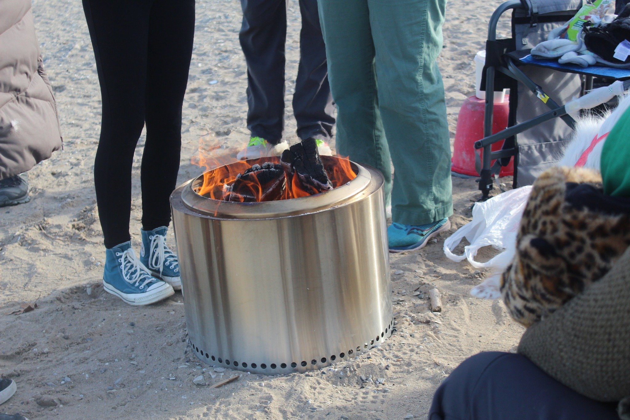 BeachBonfires_crowdOfFeet.jpeg