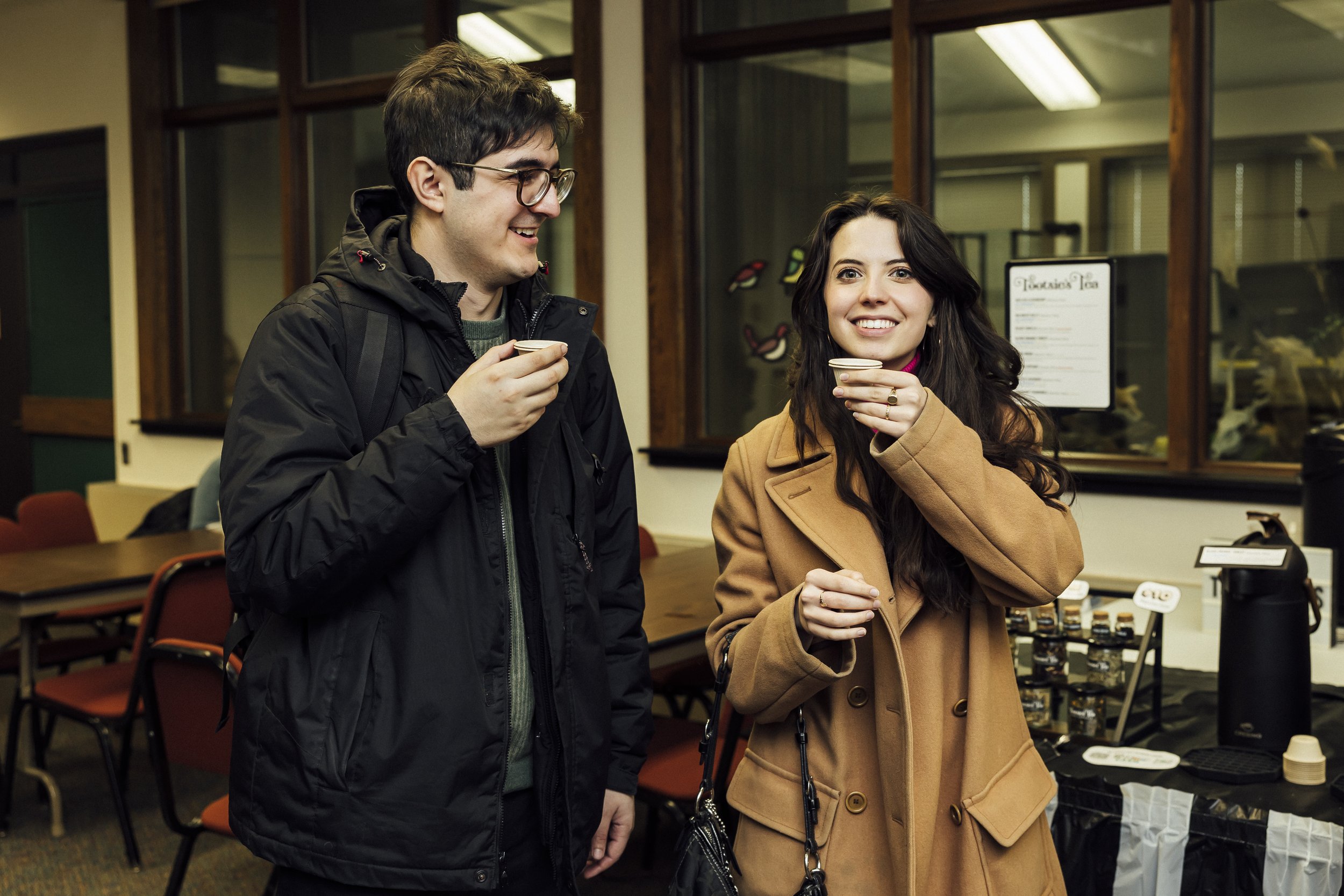Loose leaf tea mixes in glass jars with labels that say Tootsies Teas.