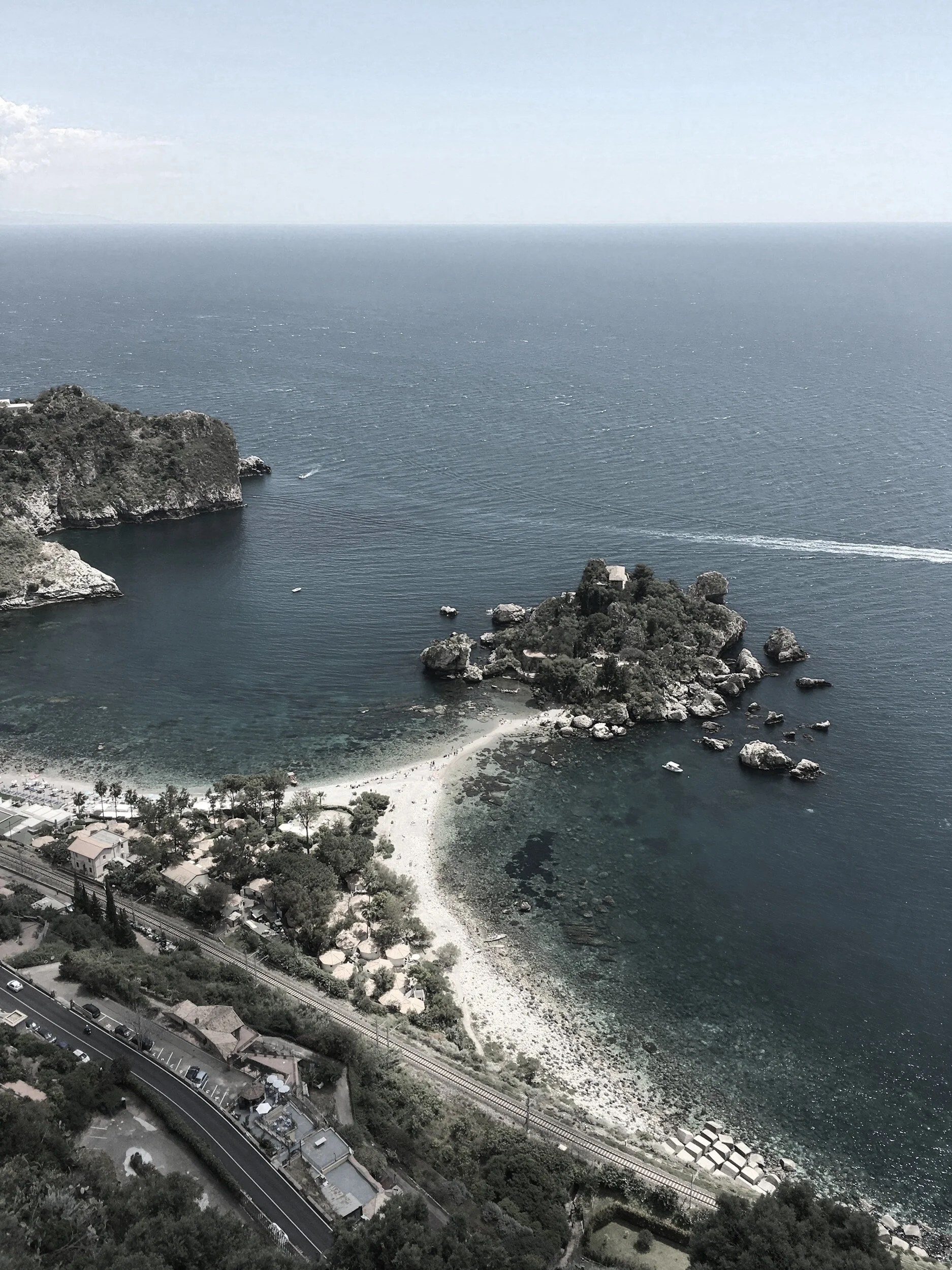 An aerial view of a coastal Sicily.