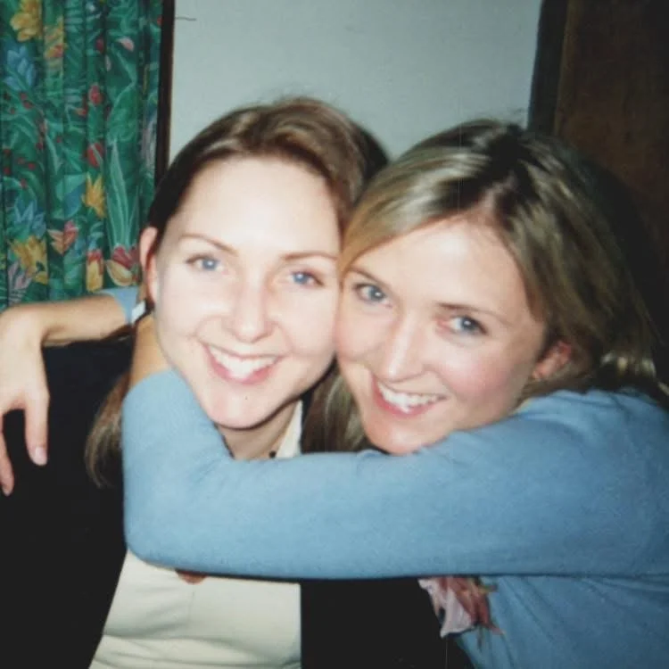 Sisters hugging and smiling for a photo