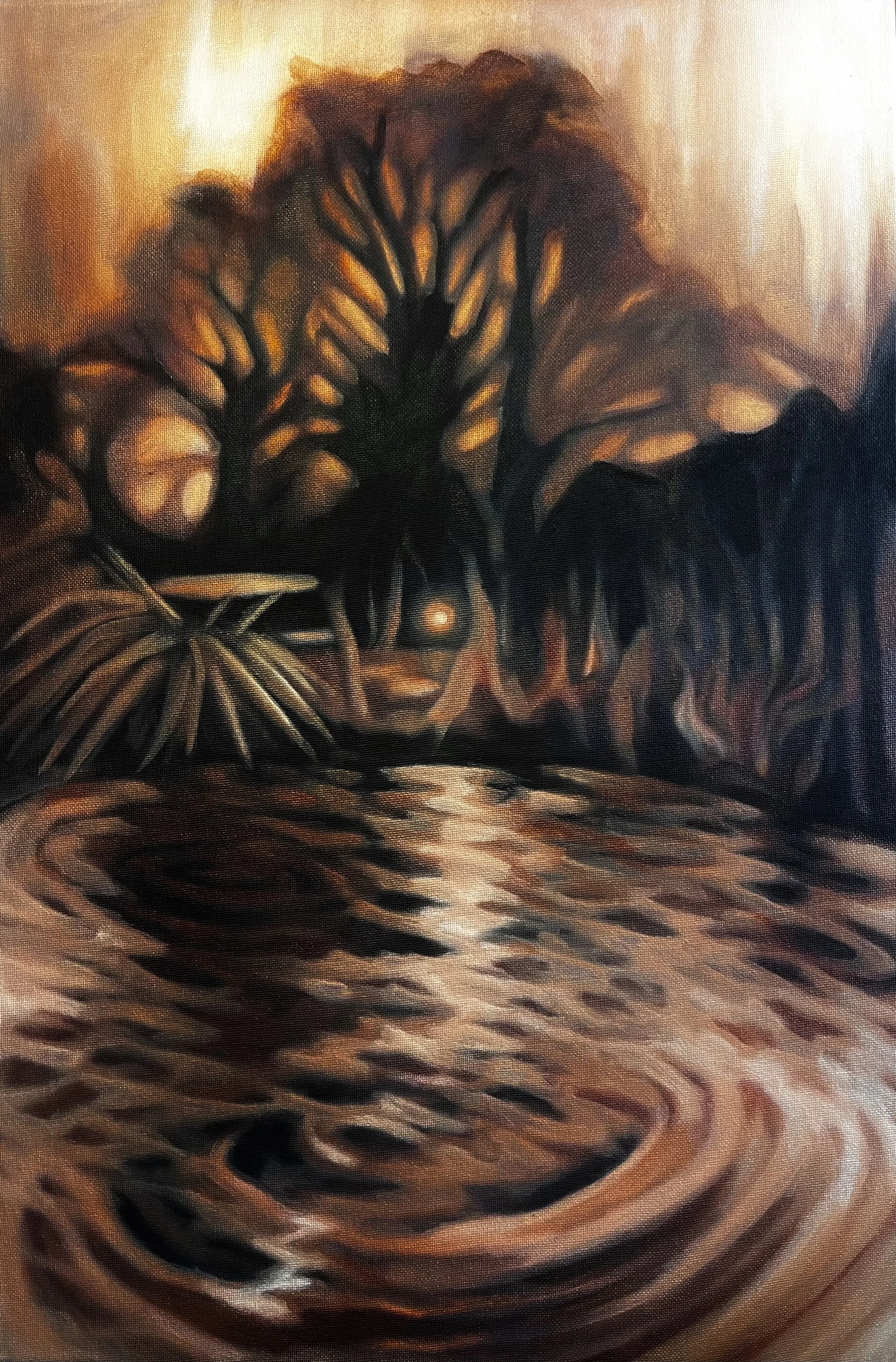 Glow in the trees and ripples in the water .jpeg