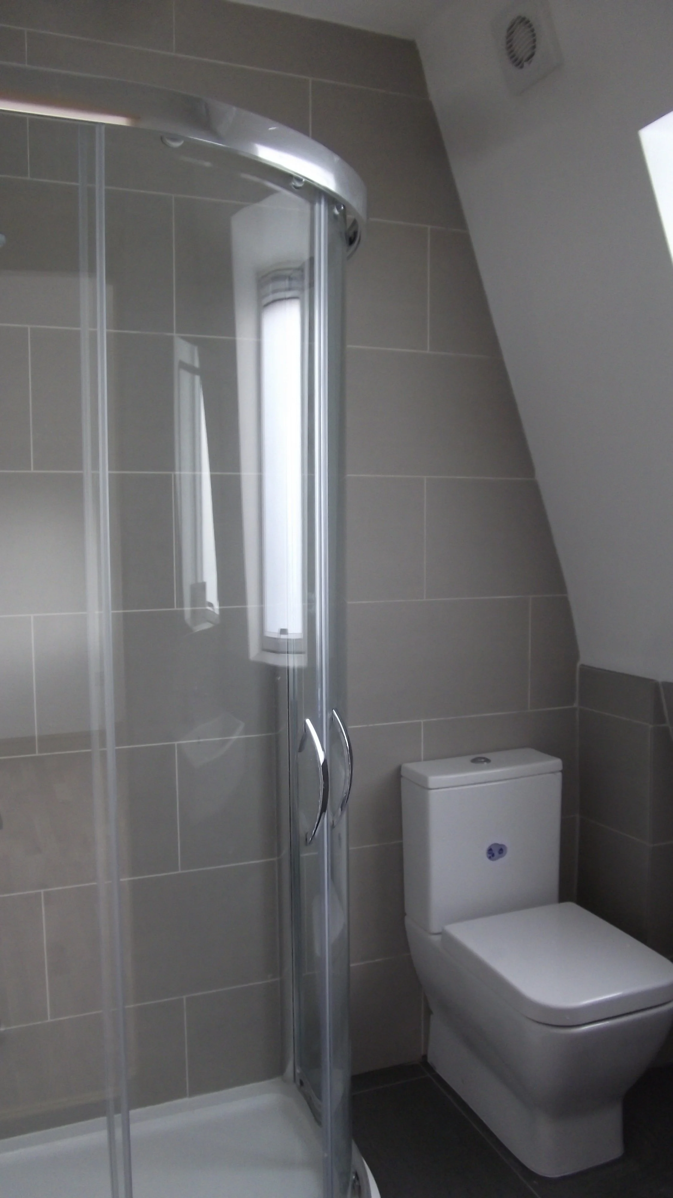 Stonebeauty En-suite shower and toilet  loft conversion, South East London