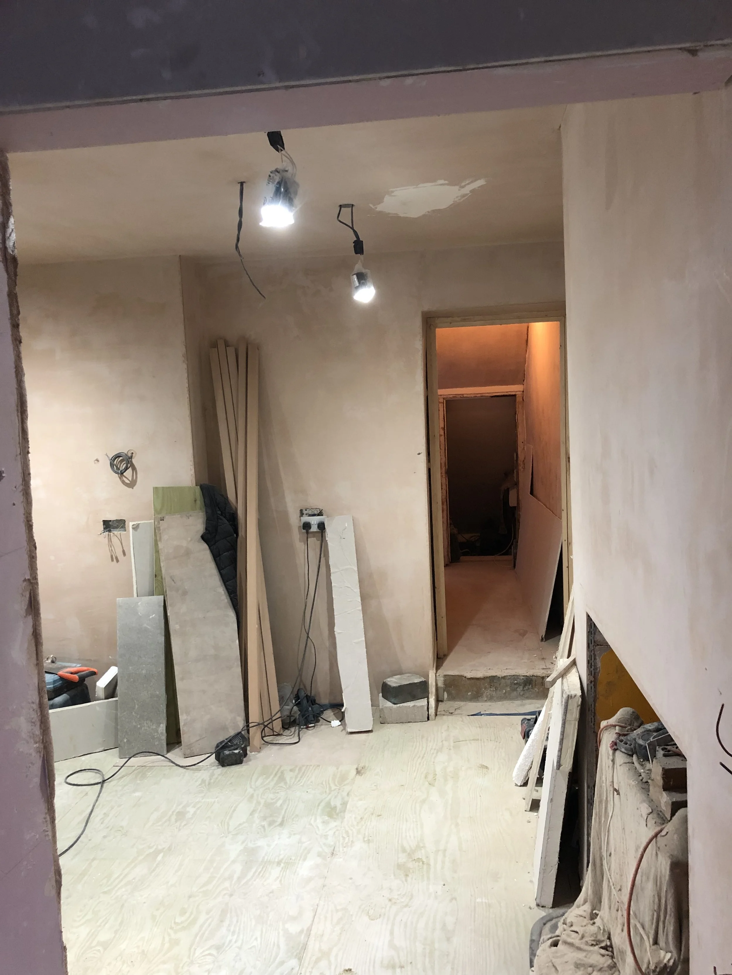 Room being refurbished with new plaster and lighting, South London