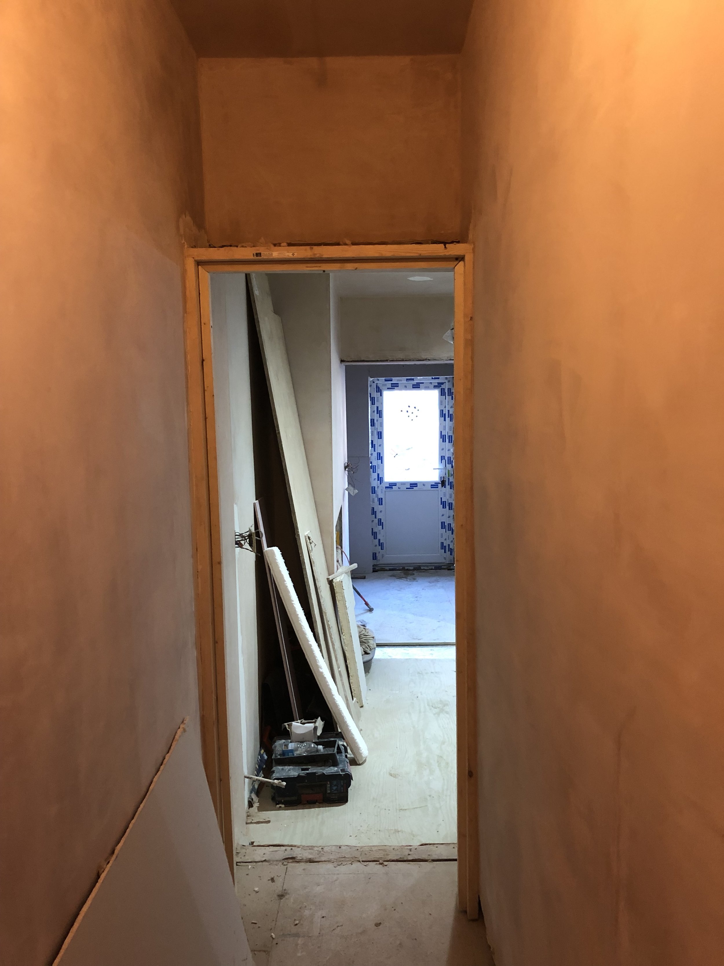 Freshly plastered hallway before decorating, South London