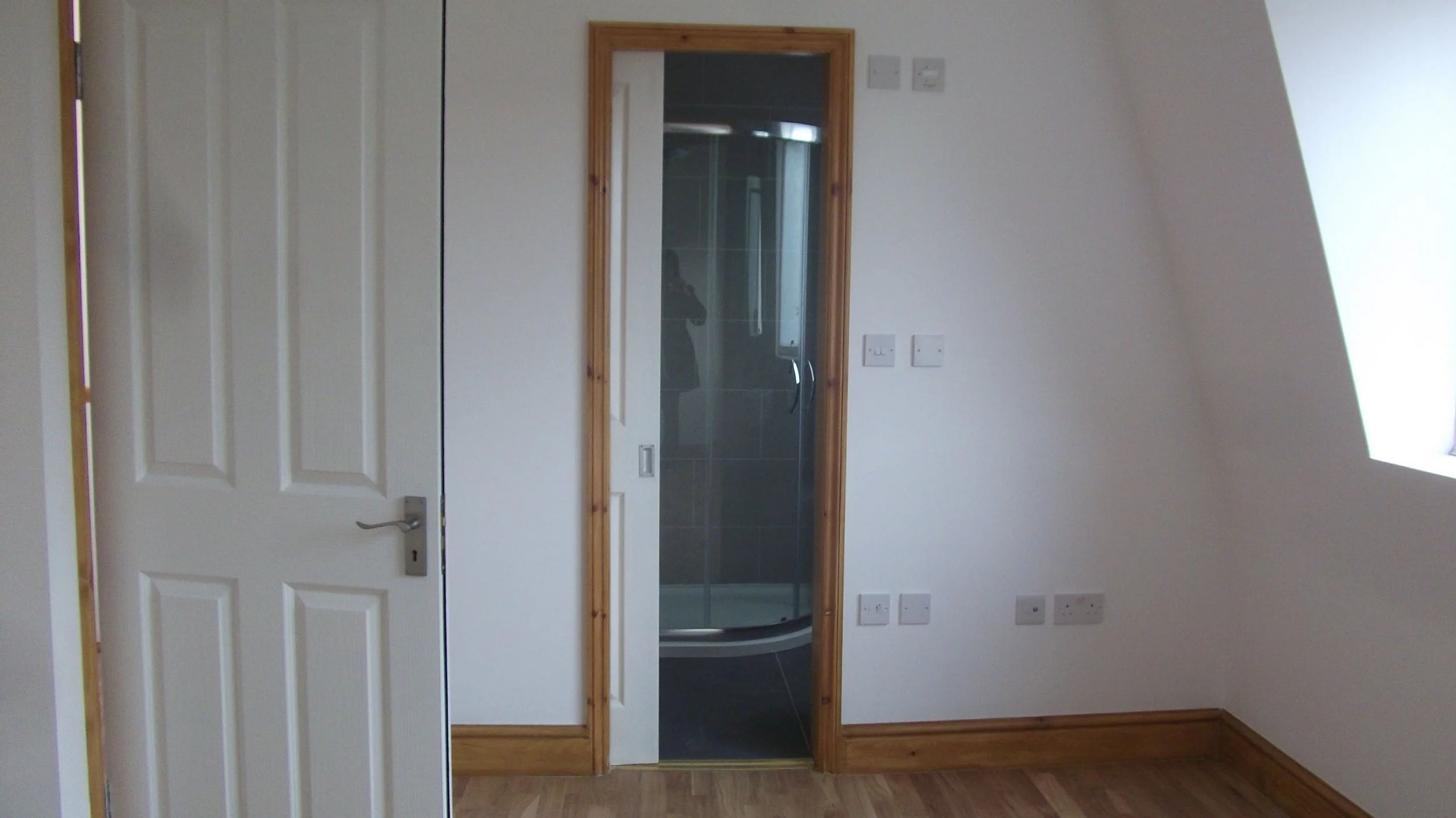 Loft conversion bedroom with en-suite in South East London | Stonebeauty