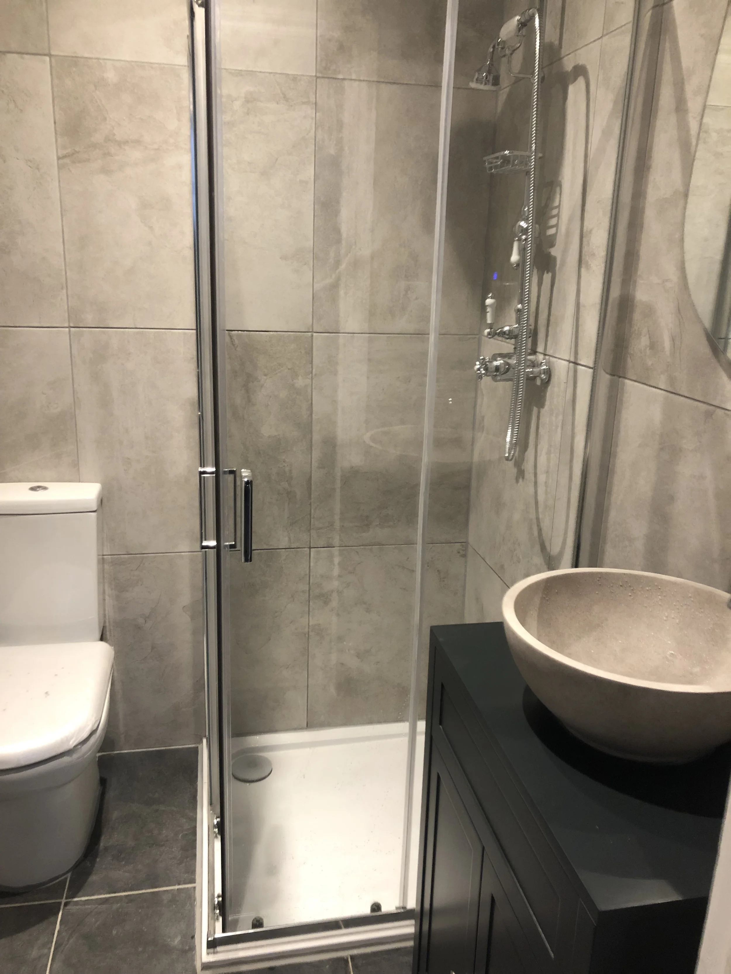 Completed bathroom with Shower, toilet and basin