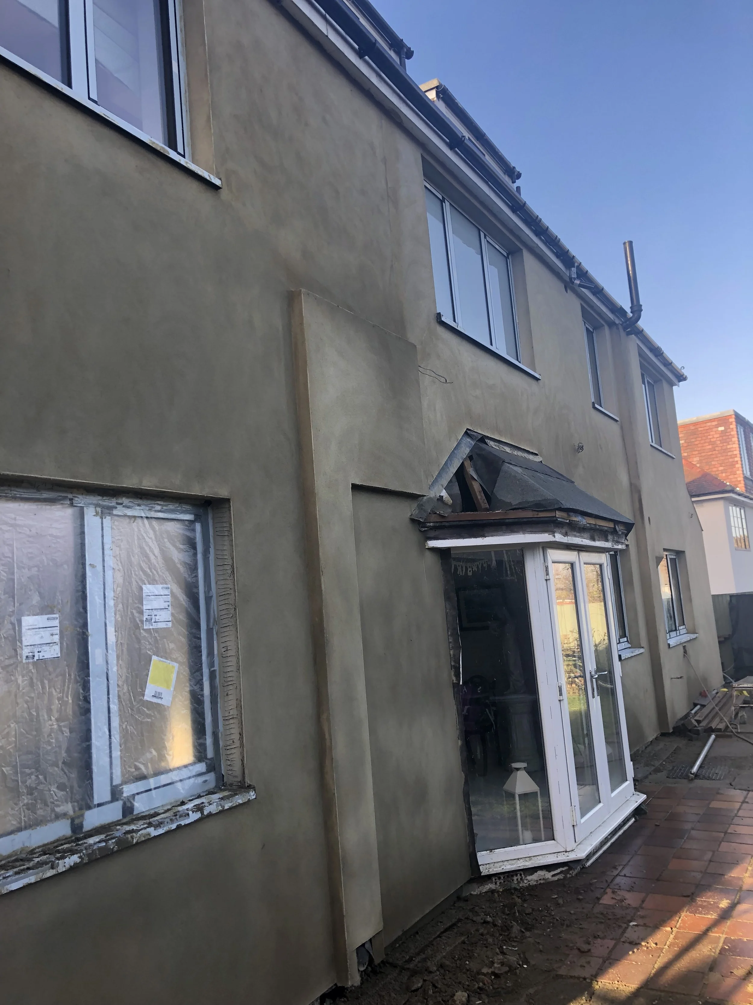 House exterior with new render, before painting, South London