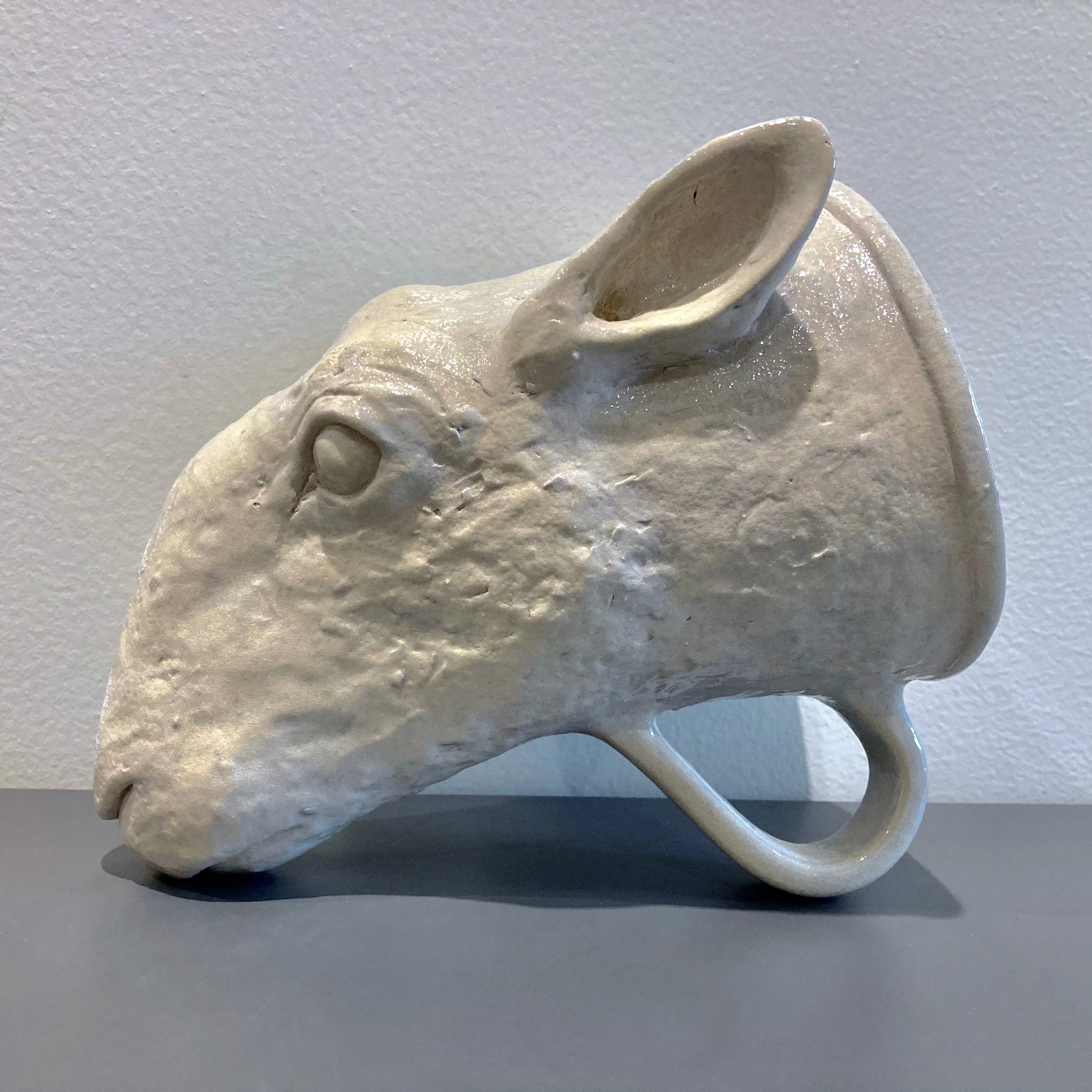       
  
     Sheep Rhyton   ceramic, 11” x 9” x 7”, 2024  


  
 #block-0d469208761b135eab77 {
    
    --stroke-style: none;--stroke-thickness: 6px;
    
      
      
      
    

--tweak-text-block-background-color: initial;

  }

  #block-0d469