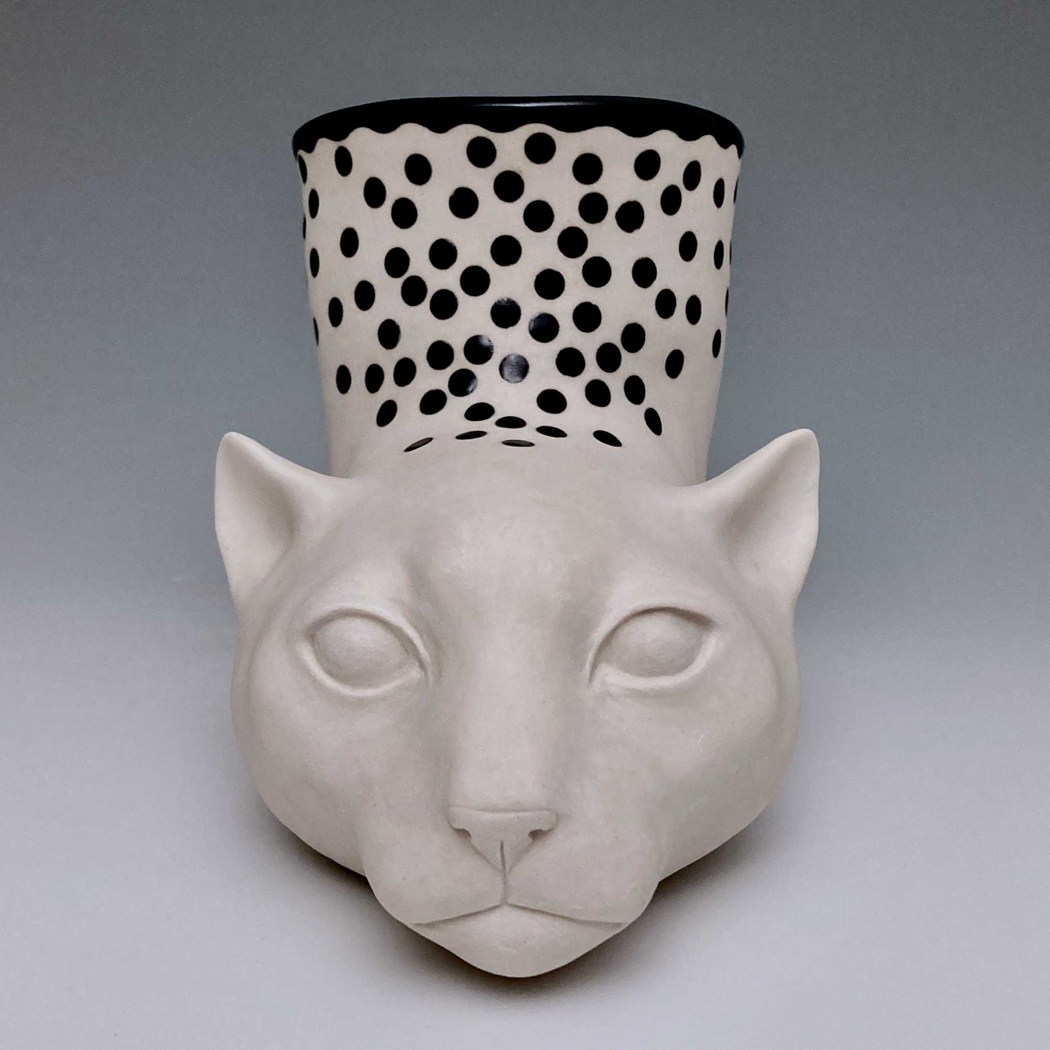       
  
     Cat Rhyton   ceramic, 9.75” x 5.25” x 4.5”, 2026  


  
 #block-fbac18fbf9cee57ba004 {
    
    --stroke-style: none;--stroke-thickness: 6px;
    
      
      
      
    

--tweak-text-block-background-color: initial;

  }

  #block-