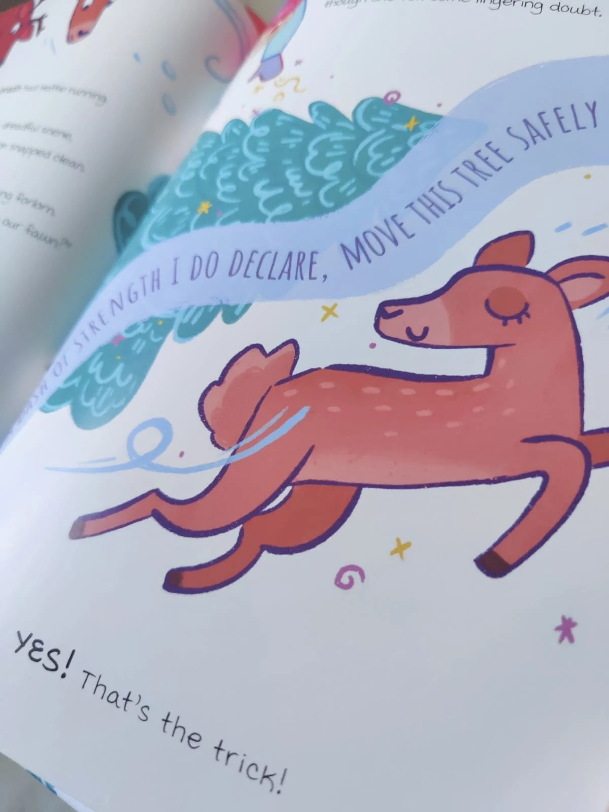 Photography of a page within 'The Confidence Trick' depicting a deer being saved by Hattie