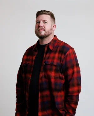 Lucas McGough, writer and project manager, in a casual portrait.