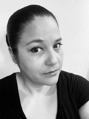 Tania Gonzalez-Ingram, political strategist, in a black-and-white portrait.
