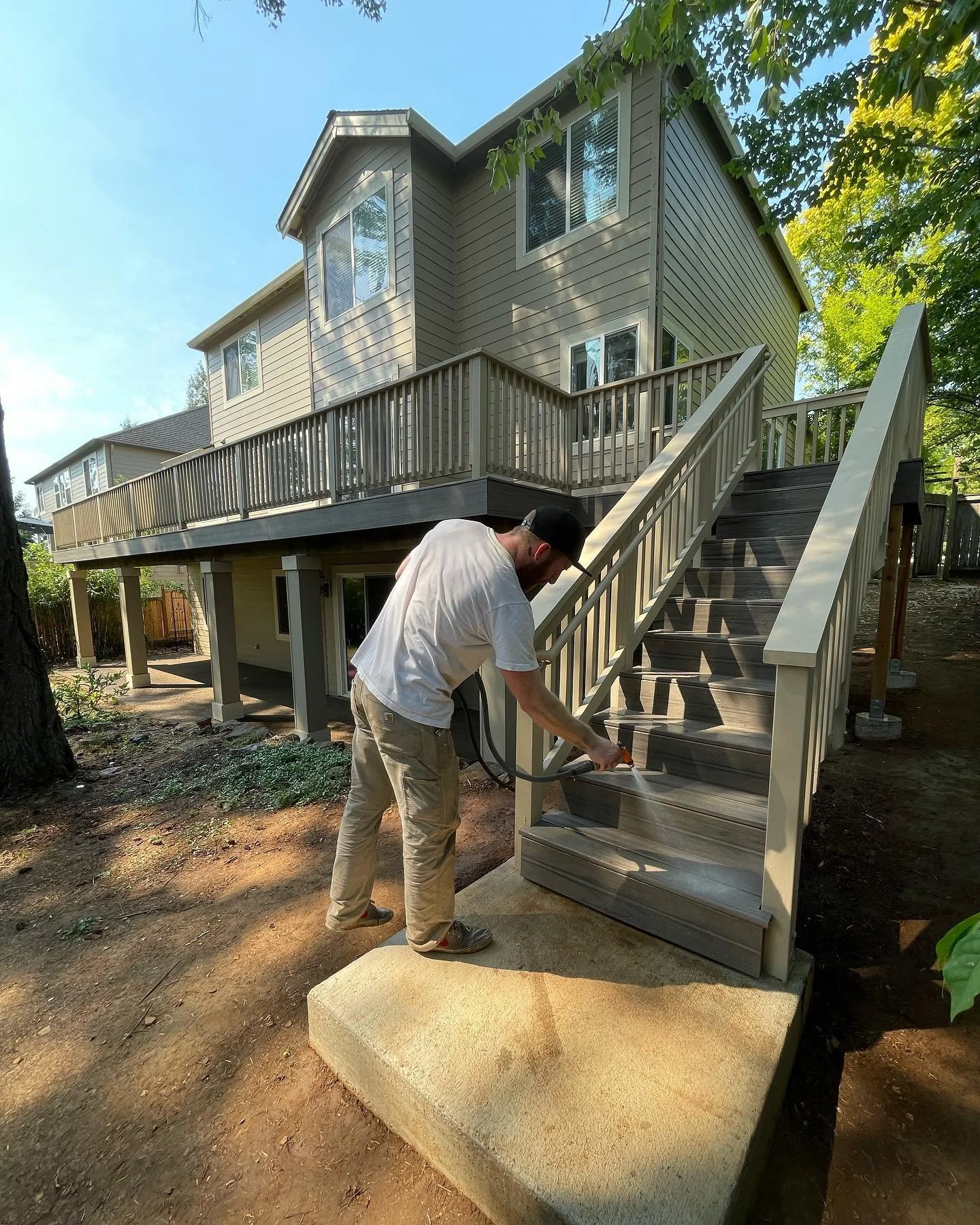 These clients wanted a dry space underneath the deck year round so we installed an under-deck drainage system, underneath the new composite decking, to divert rain water and debris.