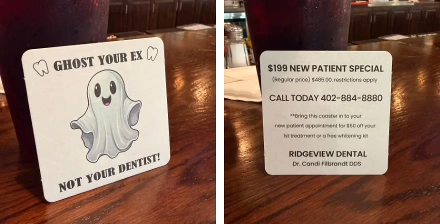 A coaster with a ghost says "ghost your ex, not your dentist." The coaster has contact info for Ridgeview Dental