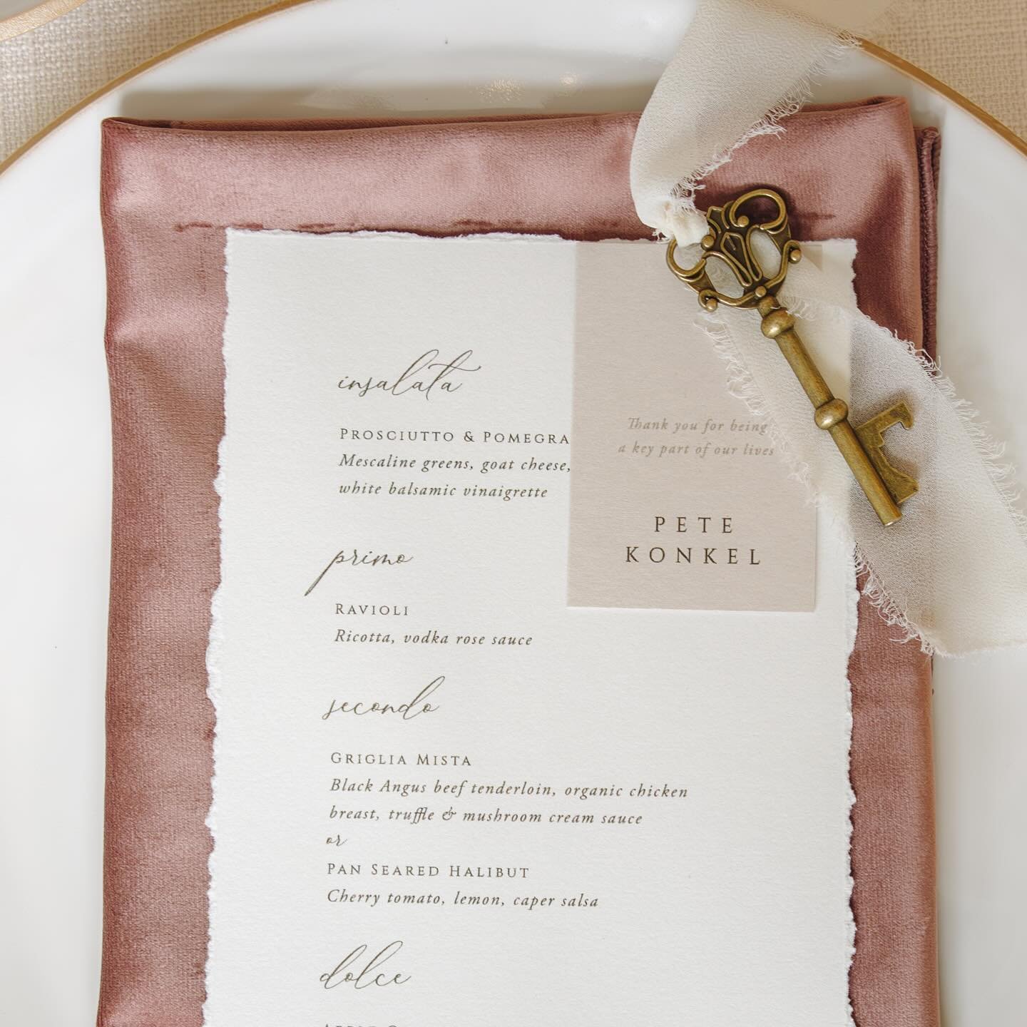 A moment on the feed for this stunning place setting for K &amp; A&rsquo;s day. Beautifully textured, hand torn menus on velvet napkins and a vintage key for each guest tied to their place card with delicate chiffon ribbon, containing a note that rea