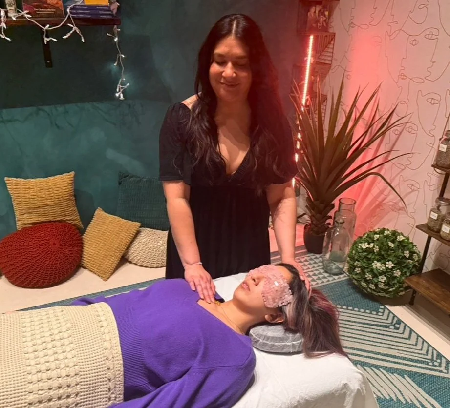 Coreen Ruiz in a private Inner Child Reiki Session in person at her studio in Astoria New York